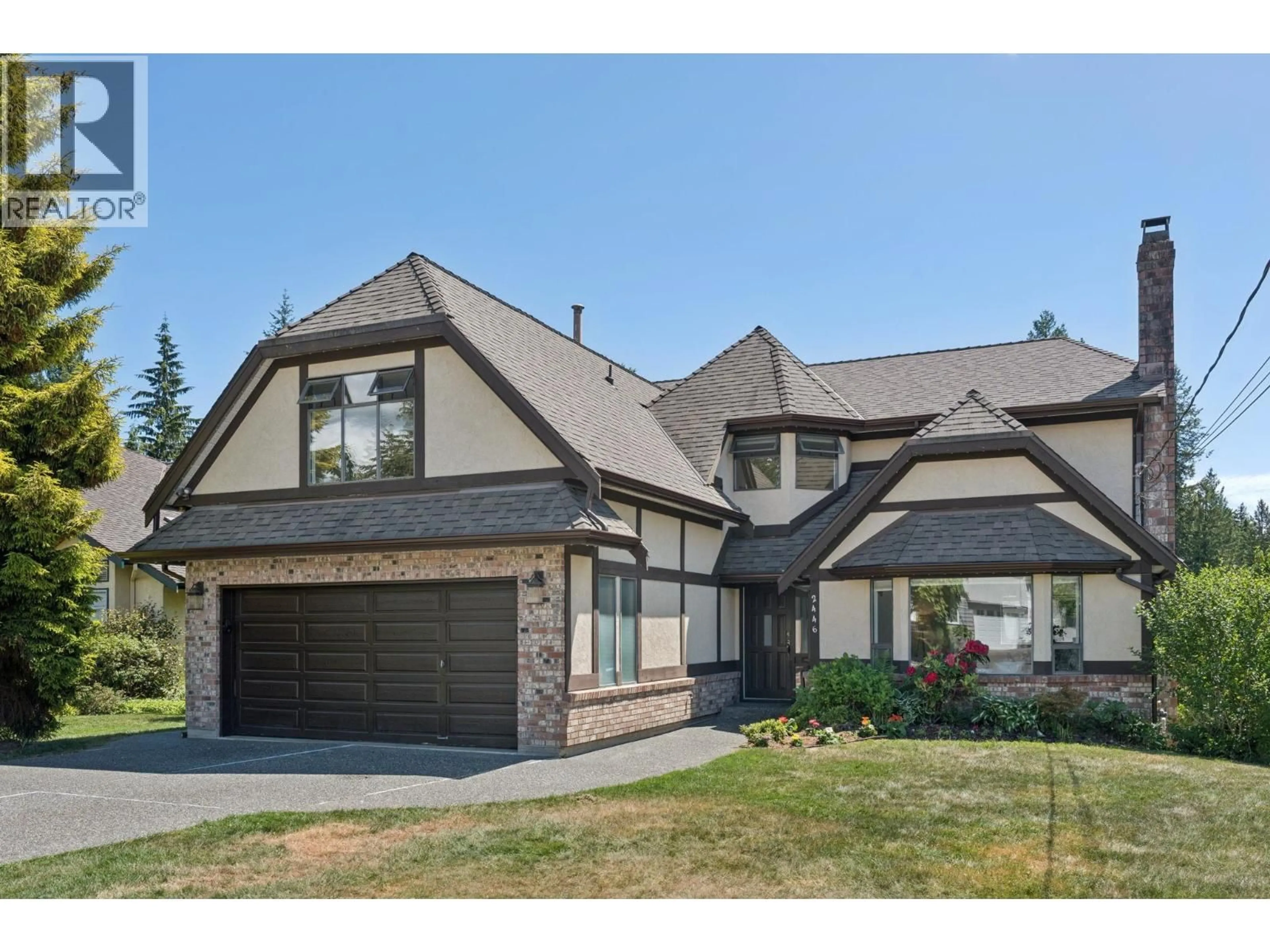 Home with brick exterior material, unknown for 2446 TOLMIE AVENUE, Coquitlam British Columbia V3K3E7
