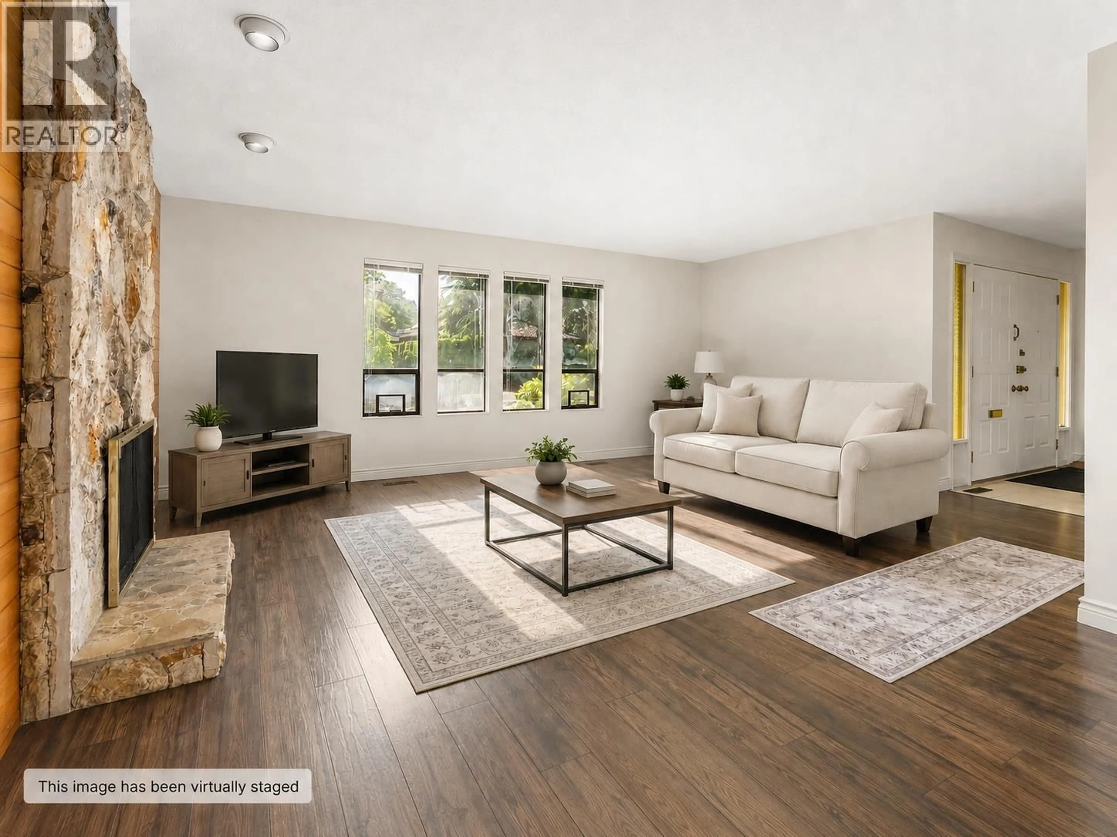 Living room with furniture, wood/laminate floor for 9566 PICKERING DRIVE, Richmond British Columbia V7E4Y3