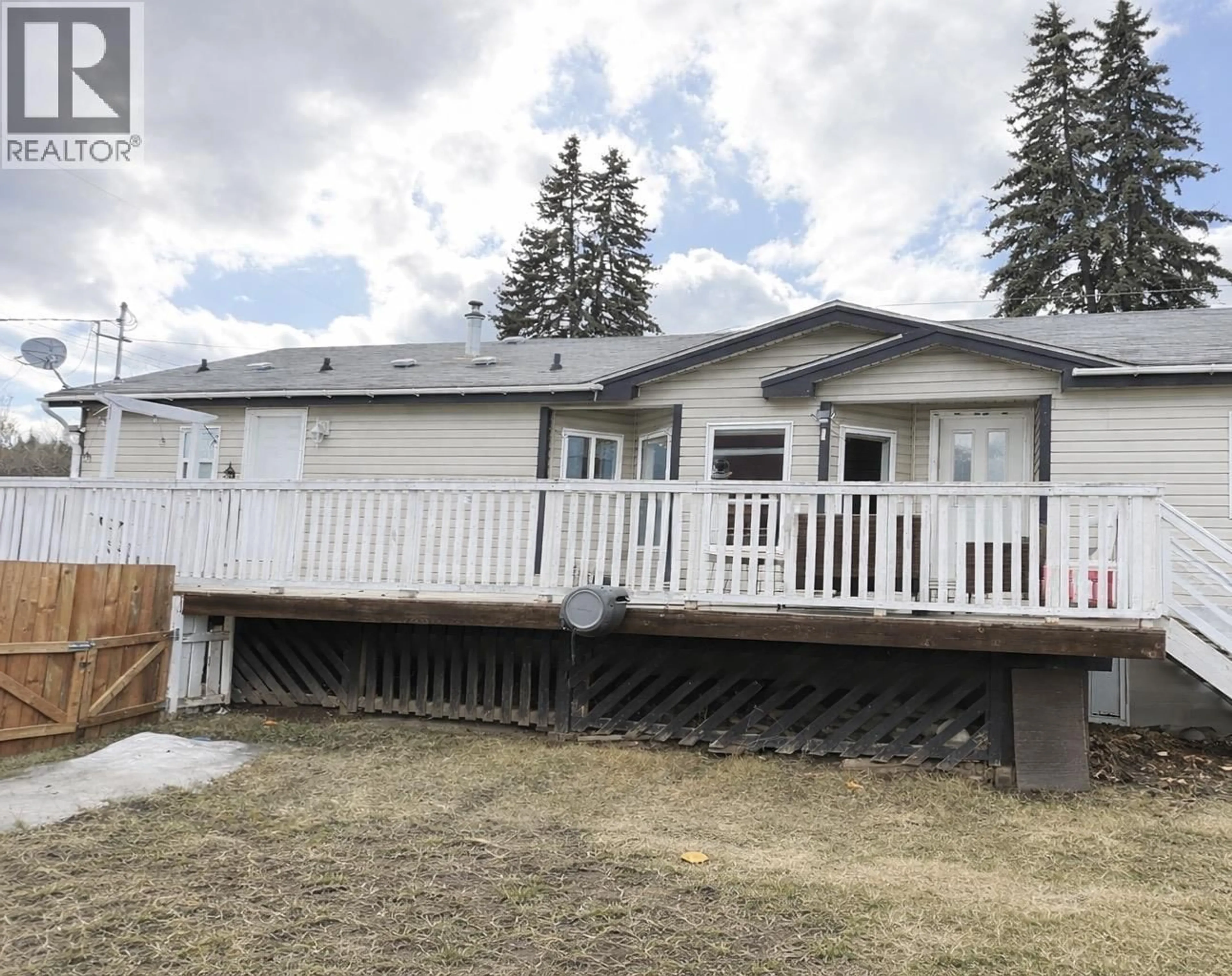 Home with vinyl exterior material, unknown for 375 3RD STREET, Vanderhoof British Columbia V0J3A0