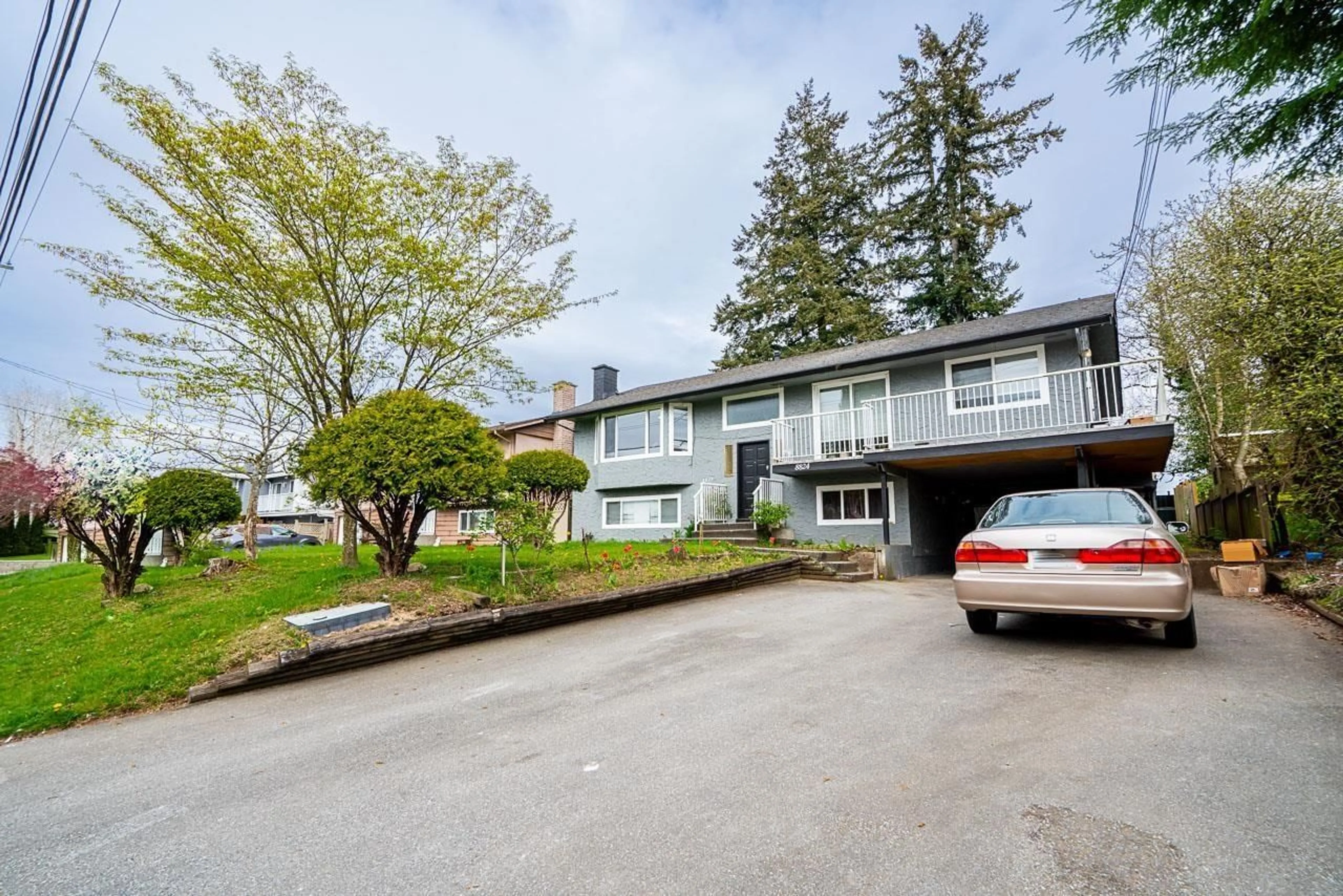 A pic from outside/outdoor area/front of a property/back of a property/a pic from drone, street for 8824 116 STREET, Delta British Columbia V4C5W5