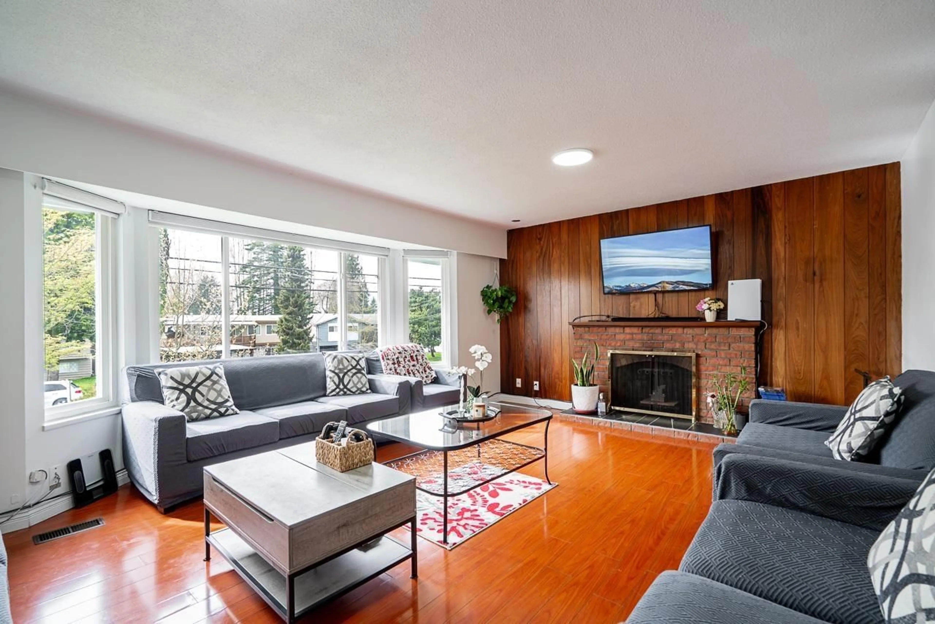 Living room with furniture, wood/laminate floor for 8824 116 STREET, Delta British Columbia V4C5W5