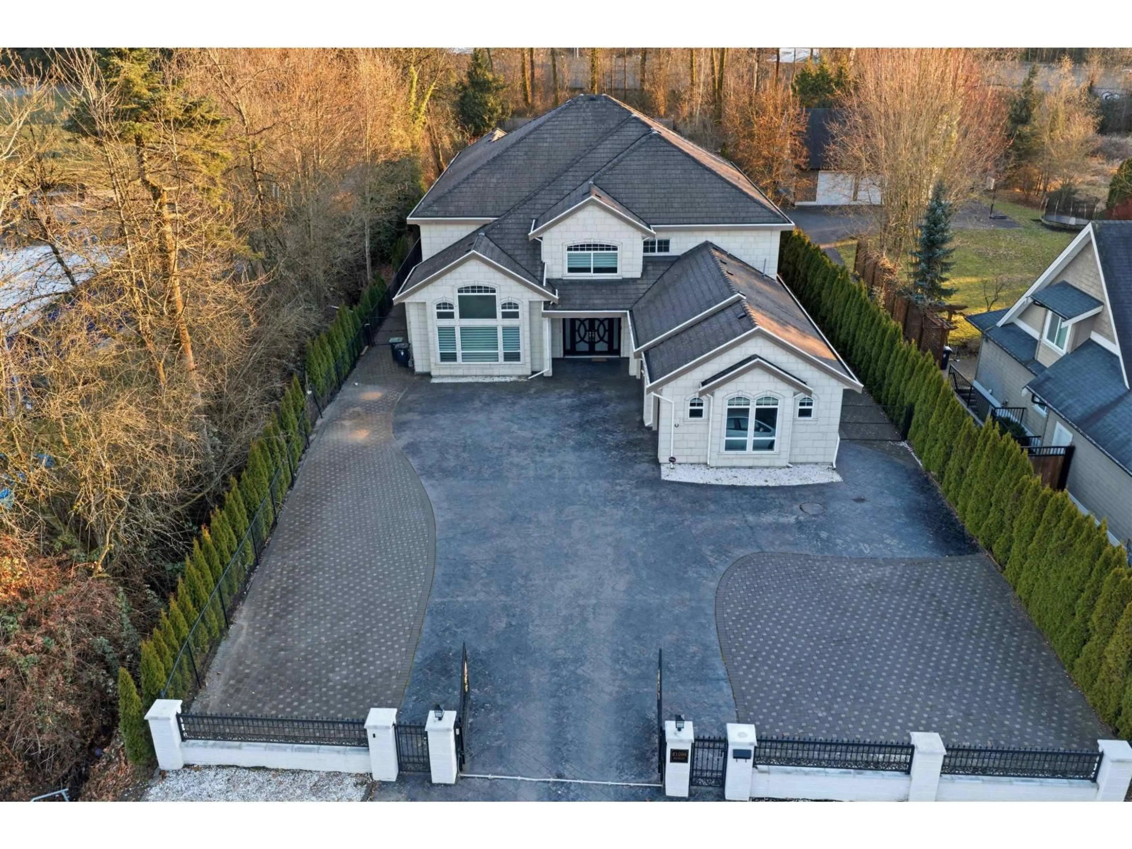 A pic from outside/outdoor area/front of a property/back of a property/a pic from drone, street for 21098 85 AVENUE, Langley British Columbia V1M2M4