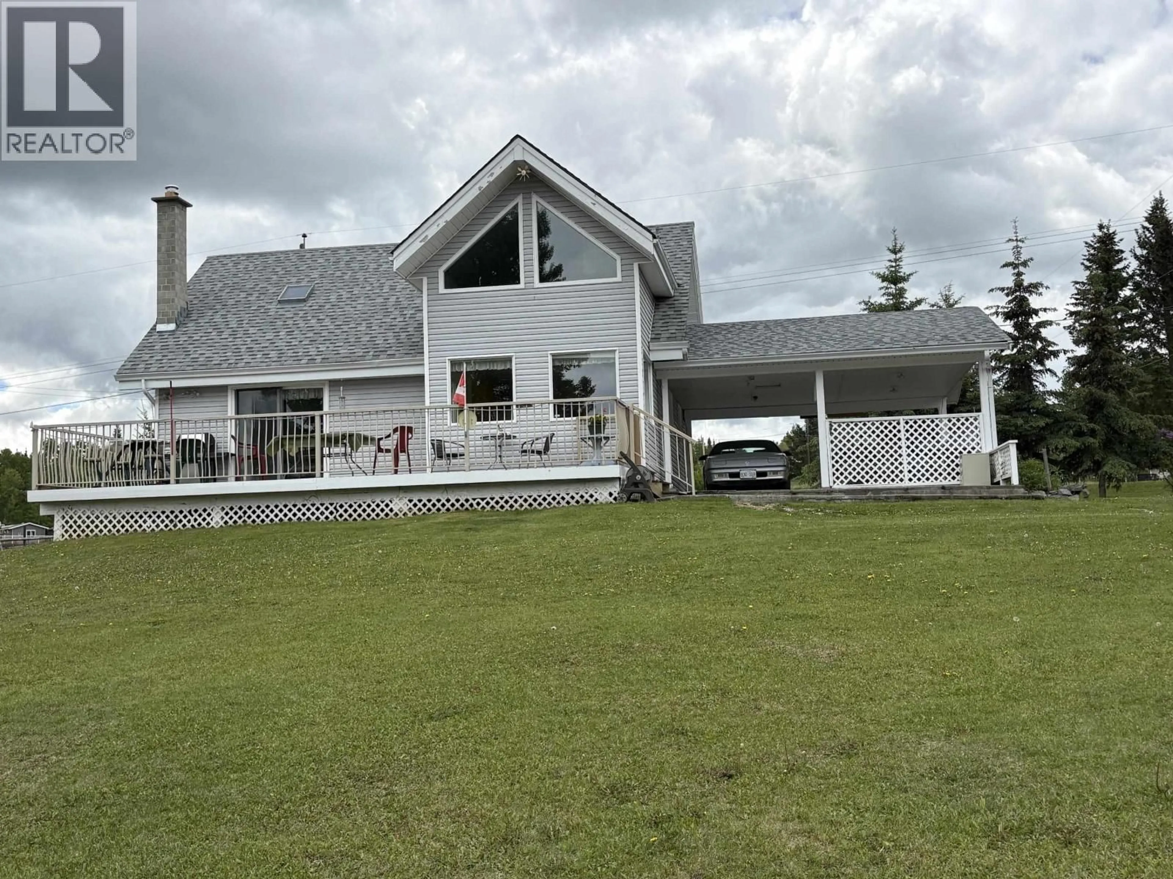 A pic from outside/outdoor area/front of a property/back of a property/a pic from drone, mountain view for 6179 HUNT ROAD, 100 Mile House British Columbia V0K2E3