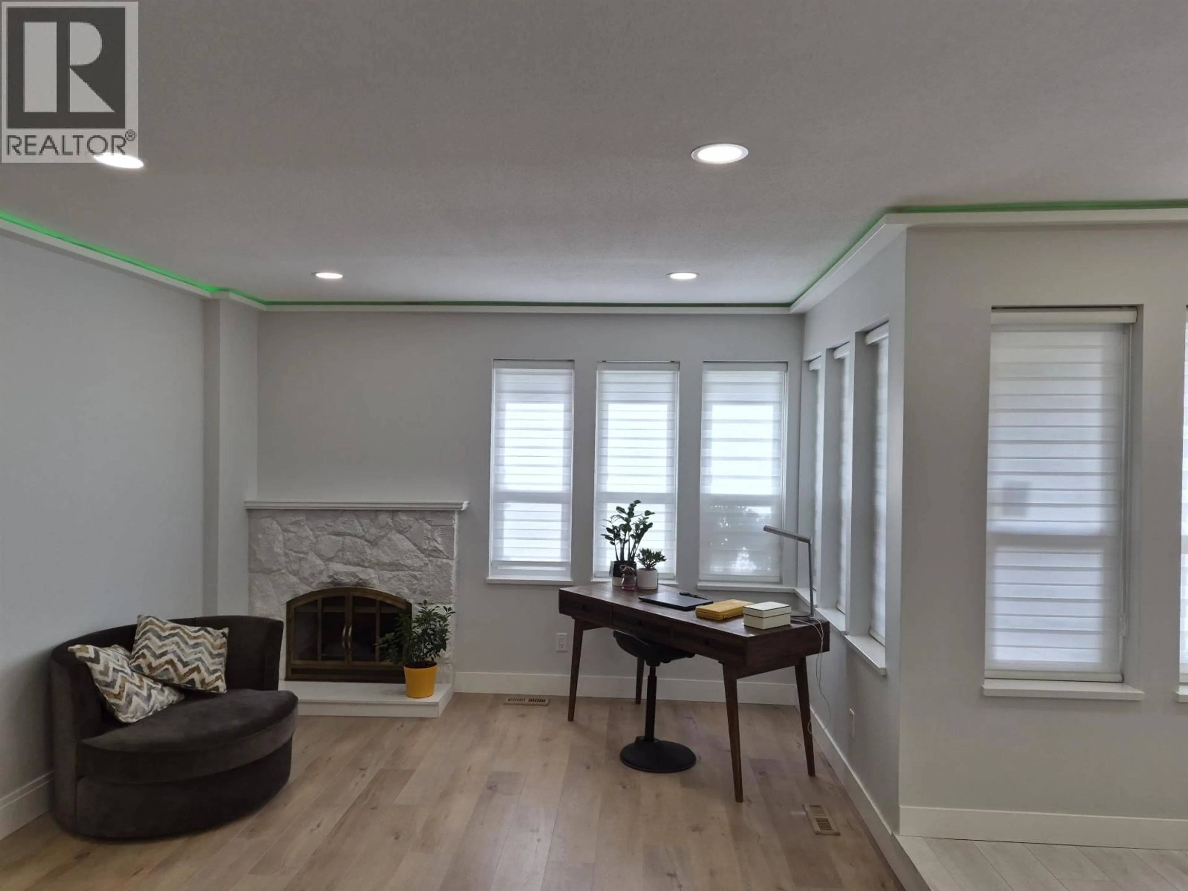 Living room with furniture, wood/laminate floor for 1858 WALNUT CRESCENT, Coquitlam British Columbia V3J7S9