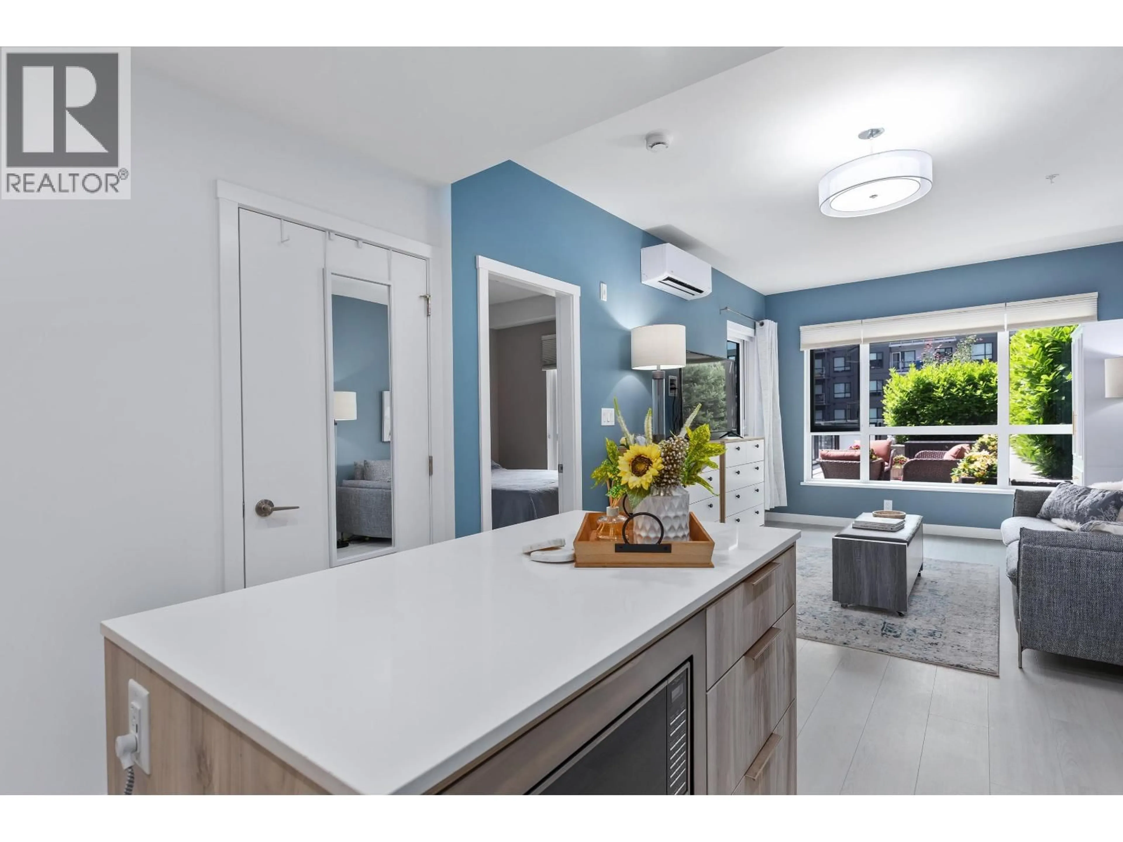 Open concept kitchen, ceramic/tile floor for 203 - 3596 MALSUM DRIVE, North Vancouver British Columbia V7G0B5