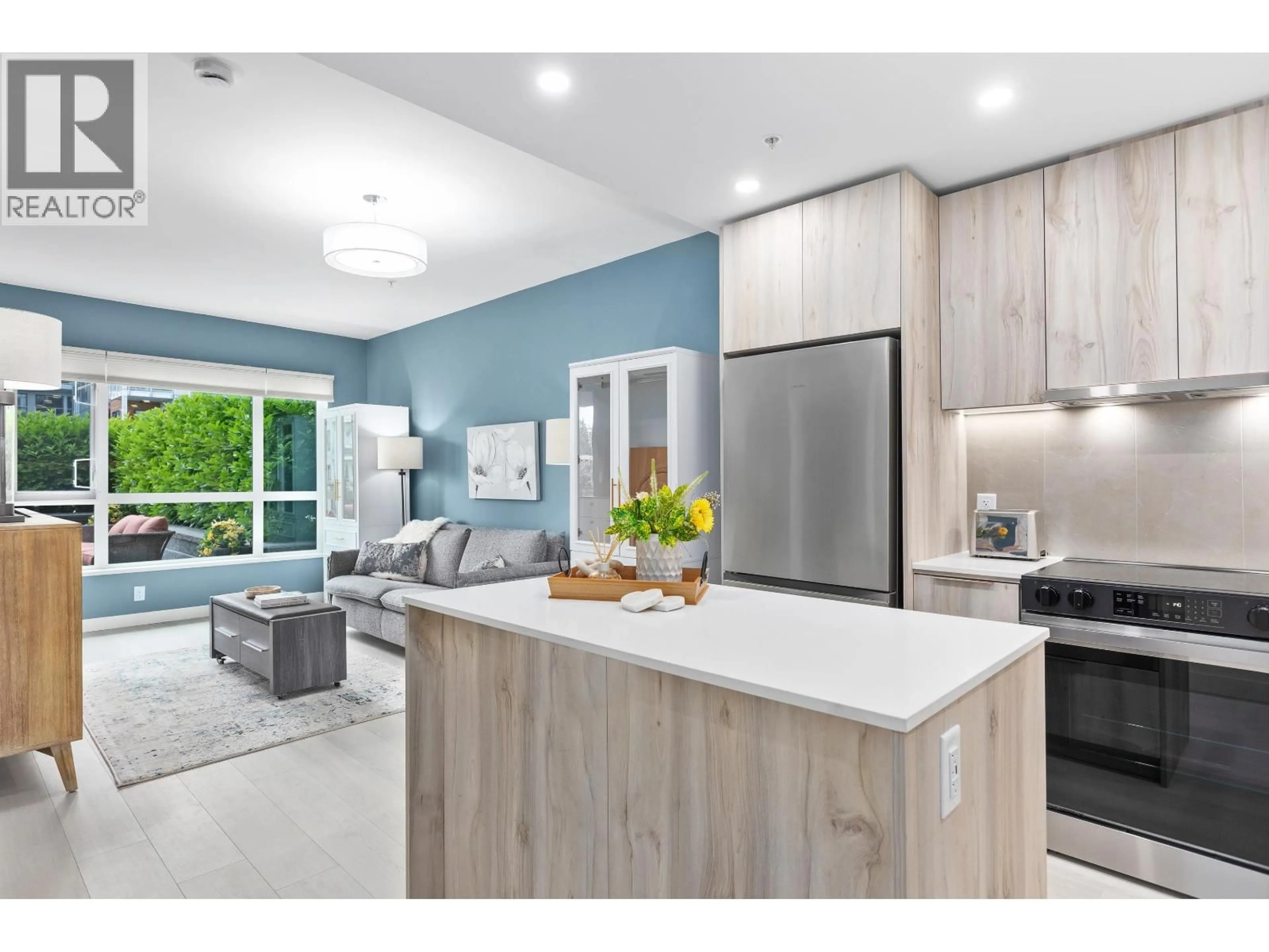 Open concept kitchen, unknown for 203 - 3596 MALSUM DRIVE, North Vancouver British Columbia V7G0B5