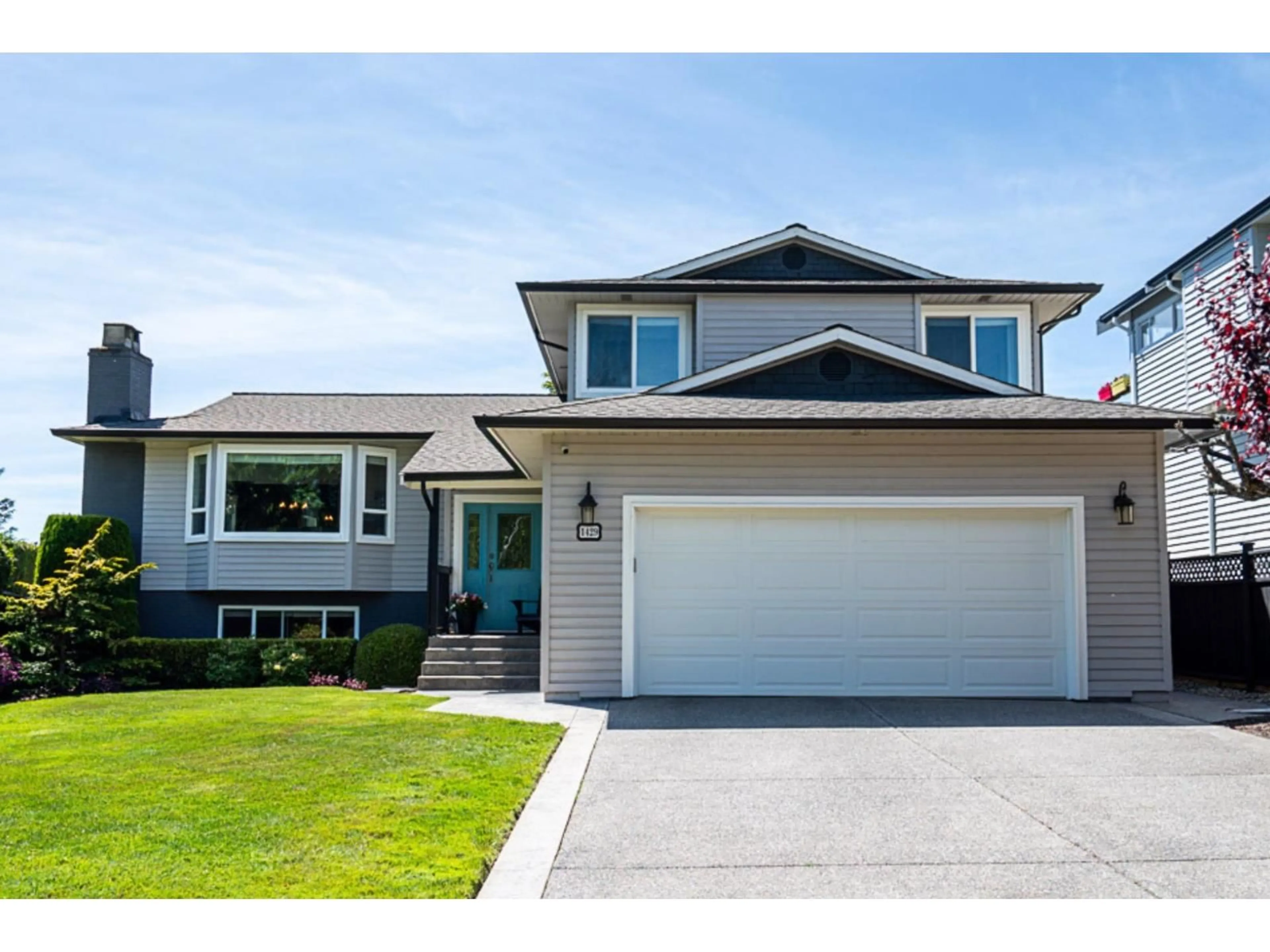 Home with vinyl exterior material, street for 1429 133A STREET, Surrey British Columbia V4A6A2