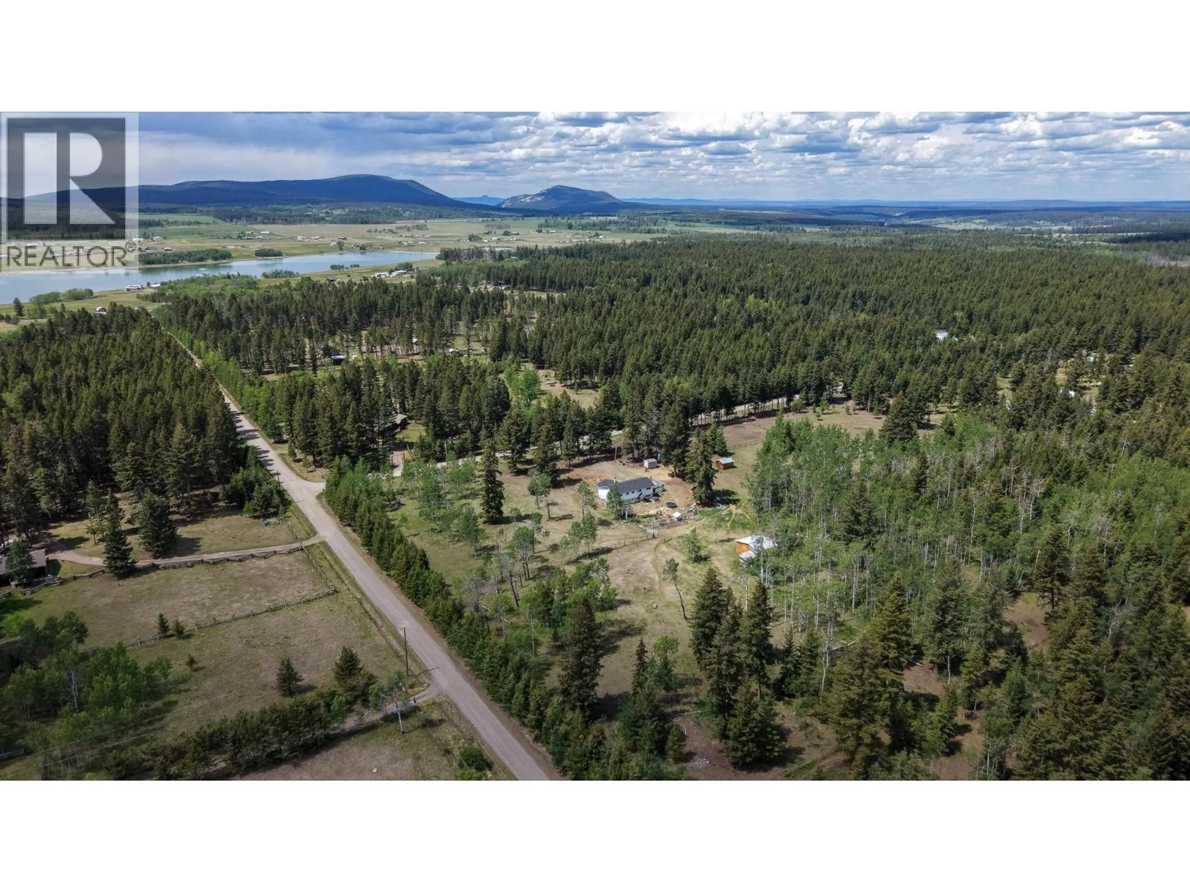 A pic from outside/outdoor area/front of a property/back of a property/a pic from drone, forest/trees view for 3322 CRANE ROAD, Williams Lake British Columbia V2G4X4