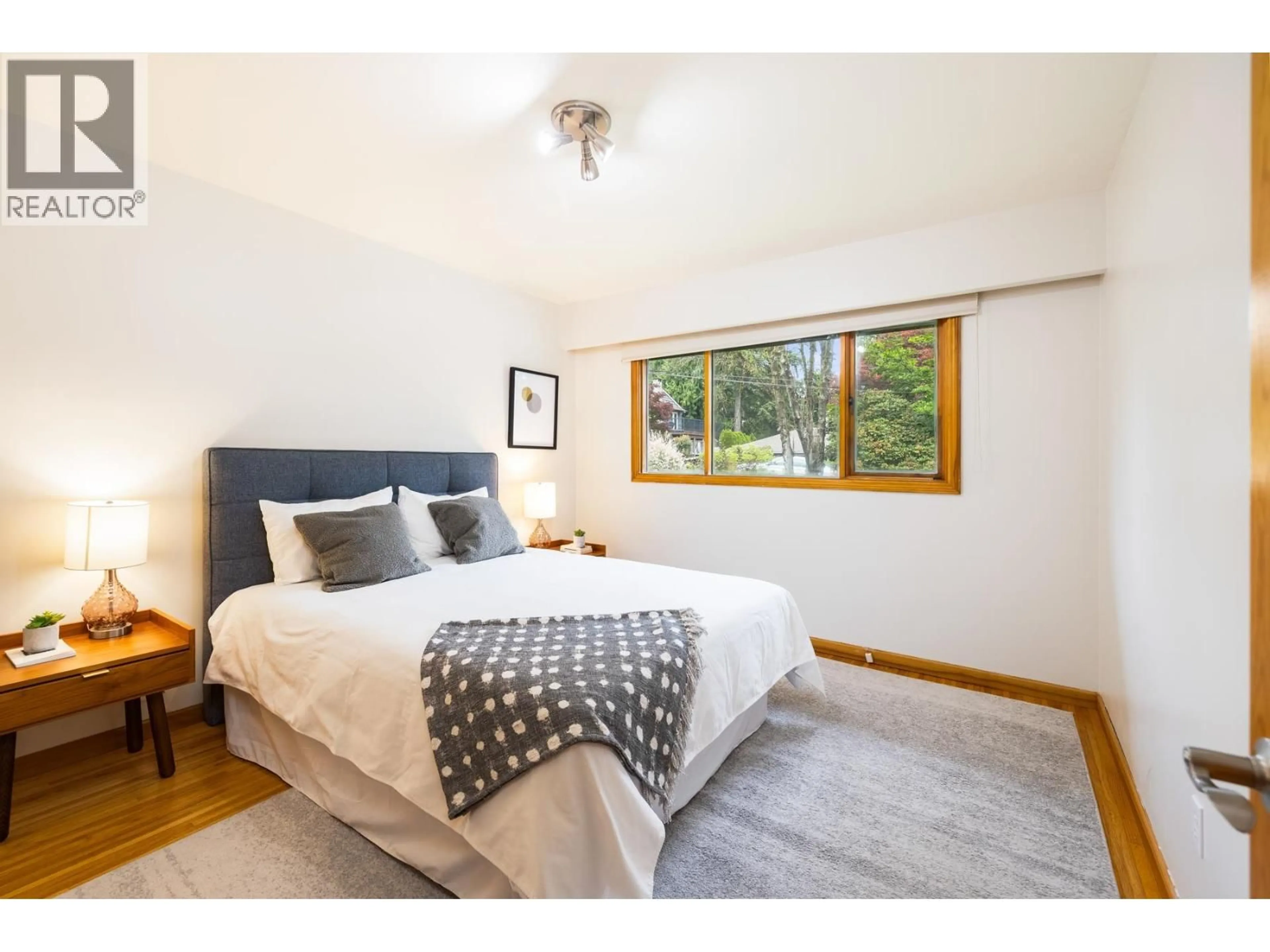 Bedroom with bed, wood/laminate floor for 1561 MERLYNN CRESCENT, North Vancouver British Columbia V7J2X9