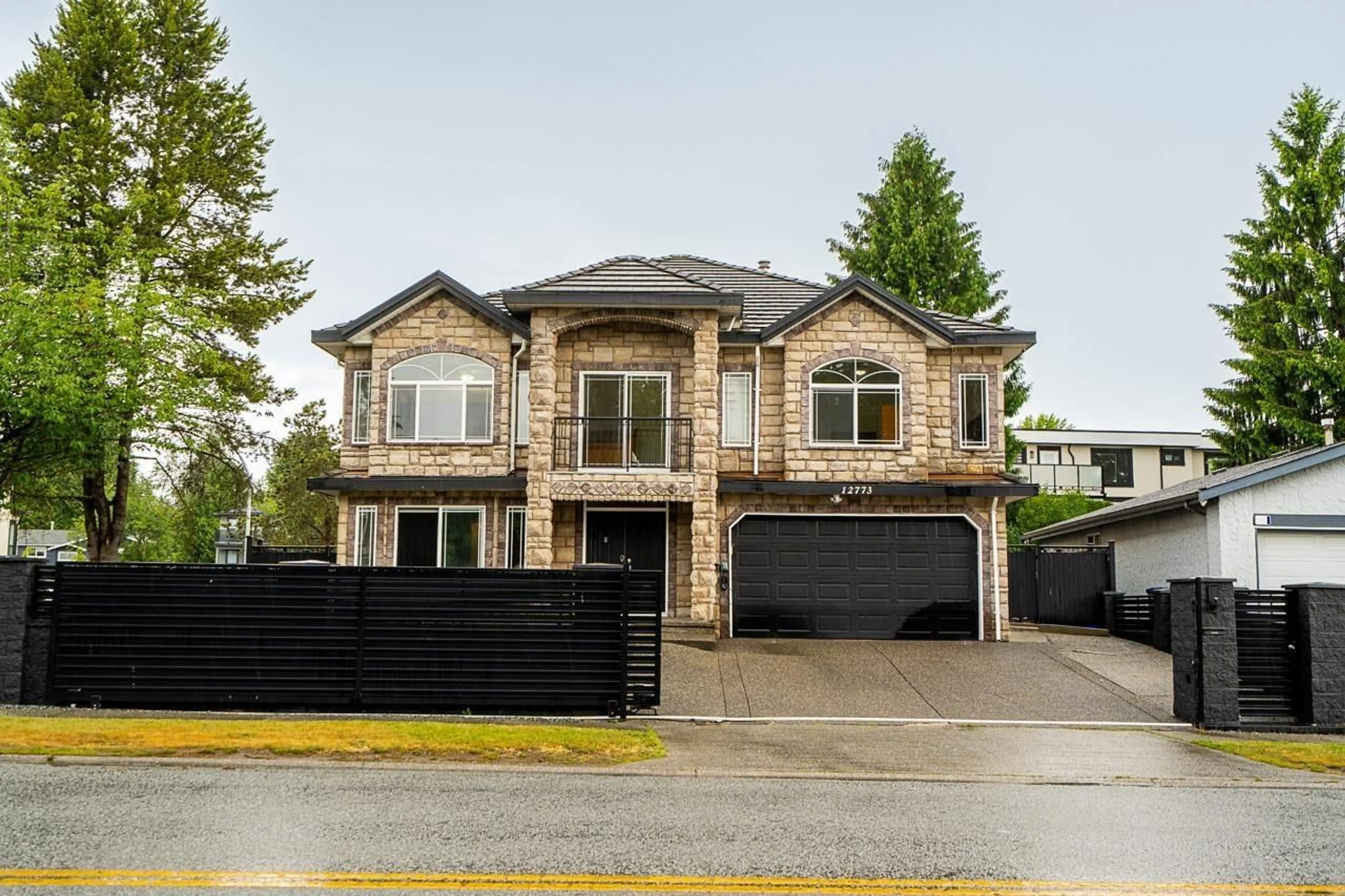Home with brick exterior material, street for 12773 90 AVENUE NORTH, Surrey British Columbia V3W3X9