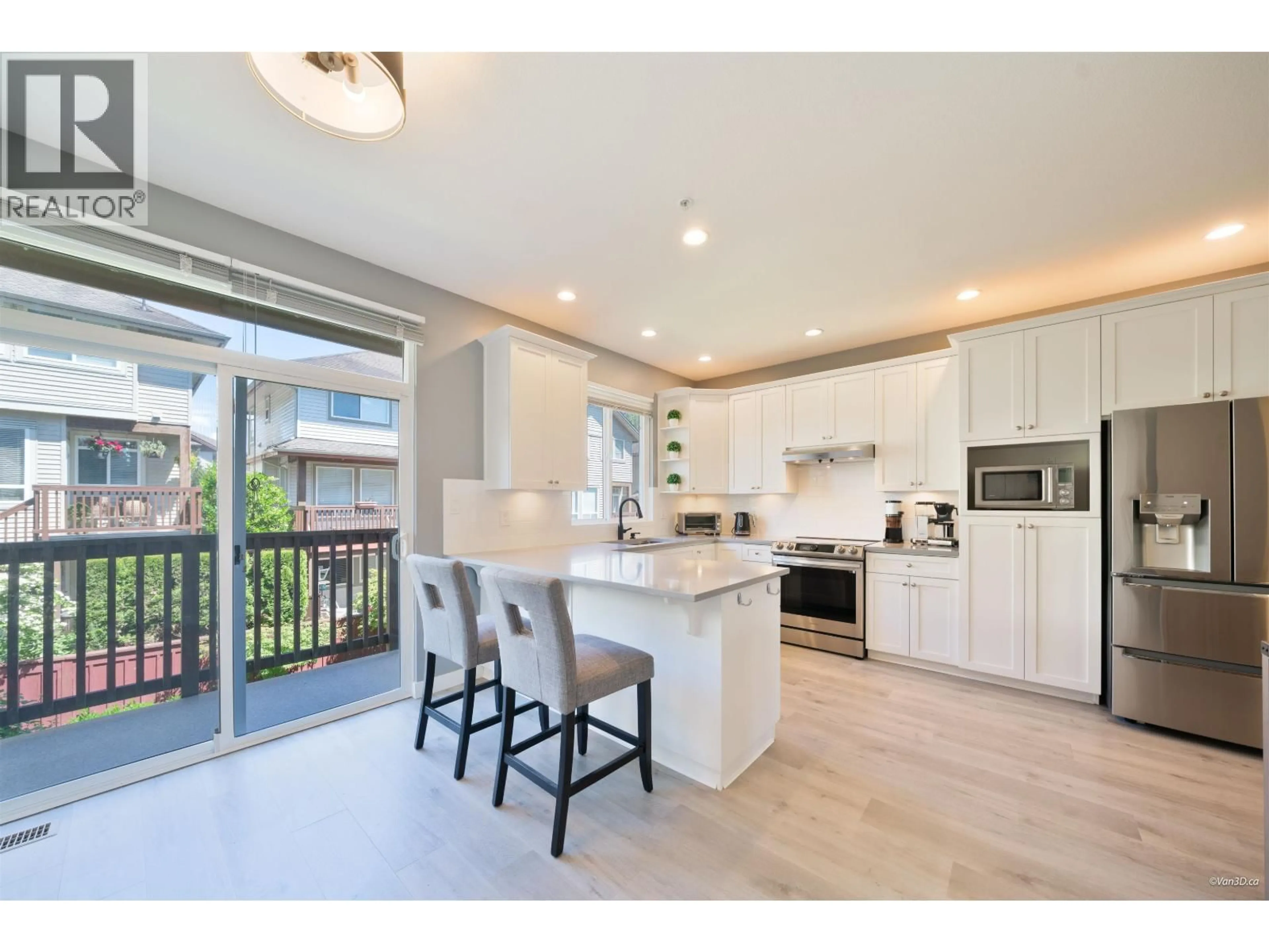 Open concept kitchen, wood/laminate floor for 23 - 2387 ARGUE STREET, Port Coquitlam British Columbia V3C6P5