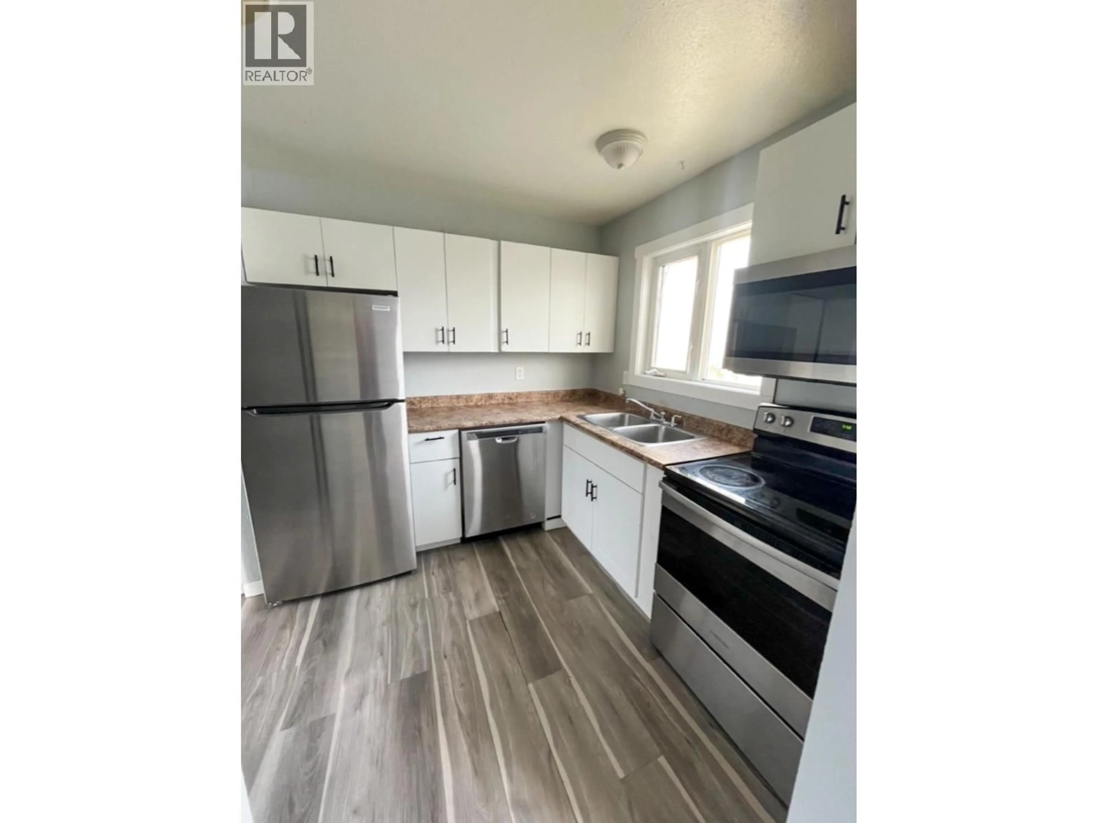 Standard kitchen, wood/laminate floor for 18 - 2007 UPLAND STREET, Prince George British Columbia V2L5B3