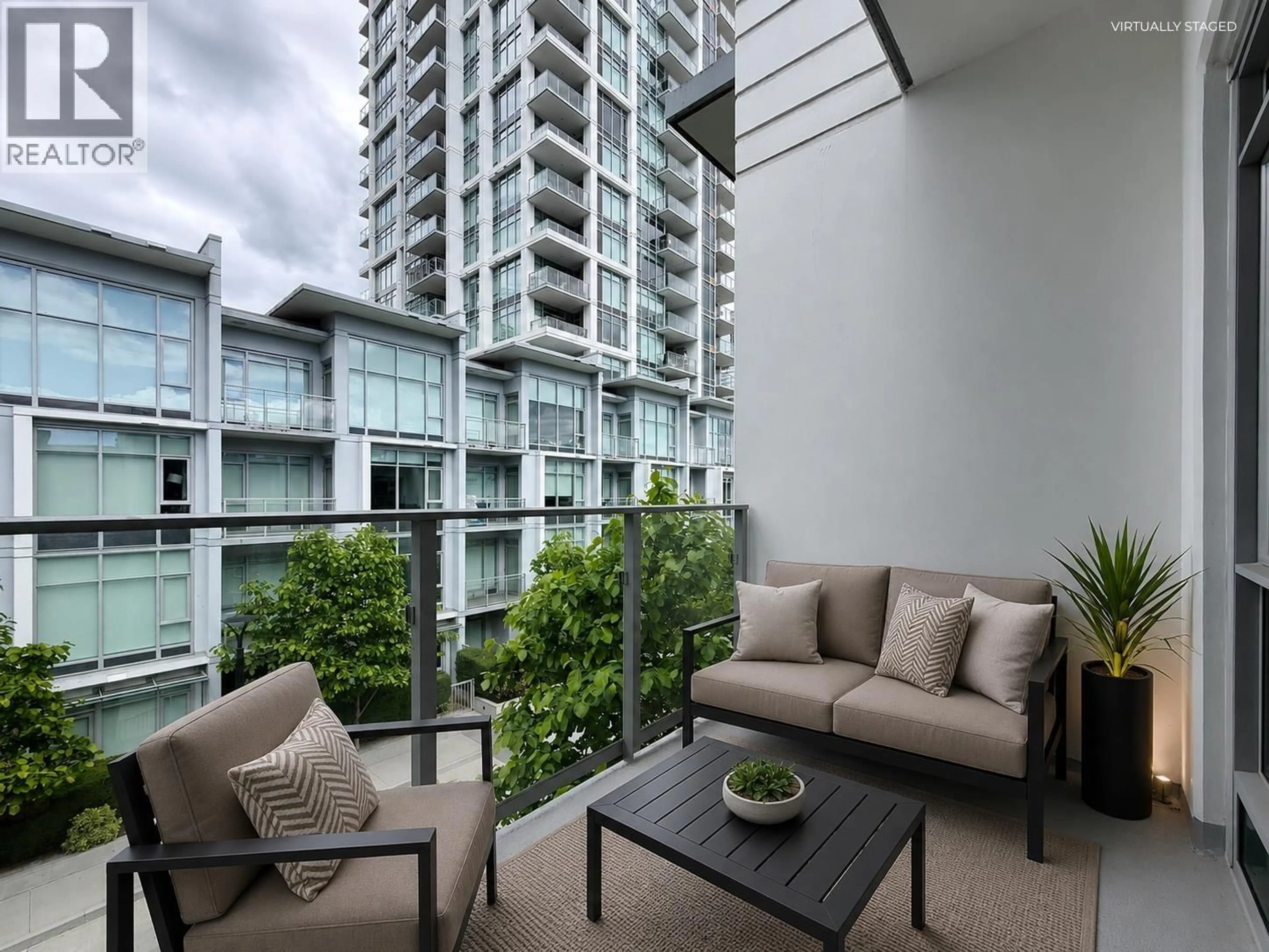 Patio, city buildings view from balcony for 311 - 2381 BETA AVENUE, Burnaby British Columbia V5C0P7