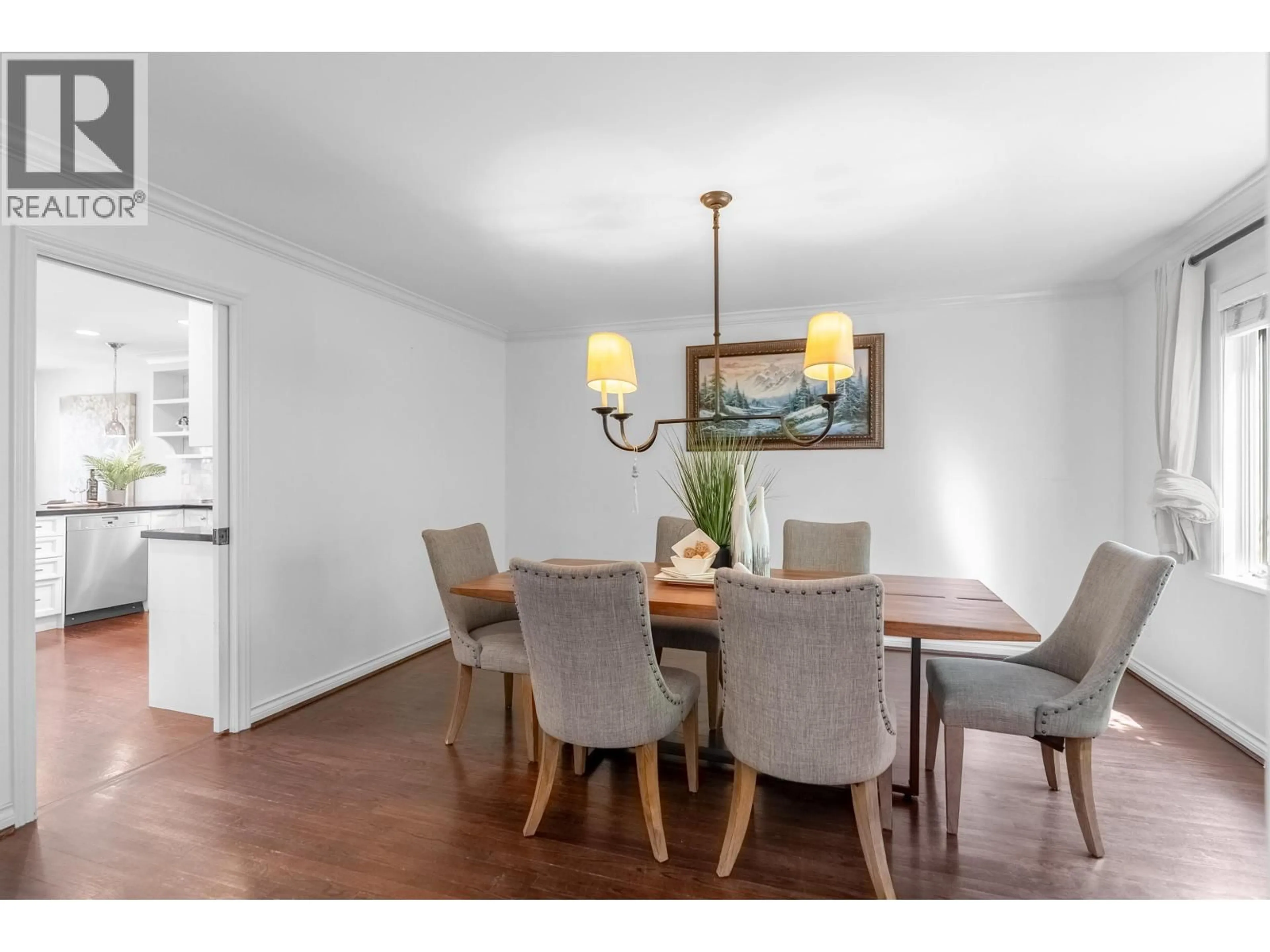 Dining room, wood/laminate floor for 3985 14TH AVENUE, Vancouver British Columbia V6R2X2
