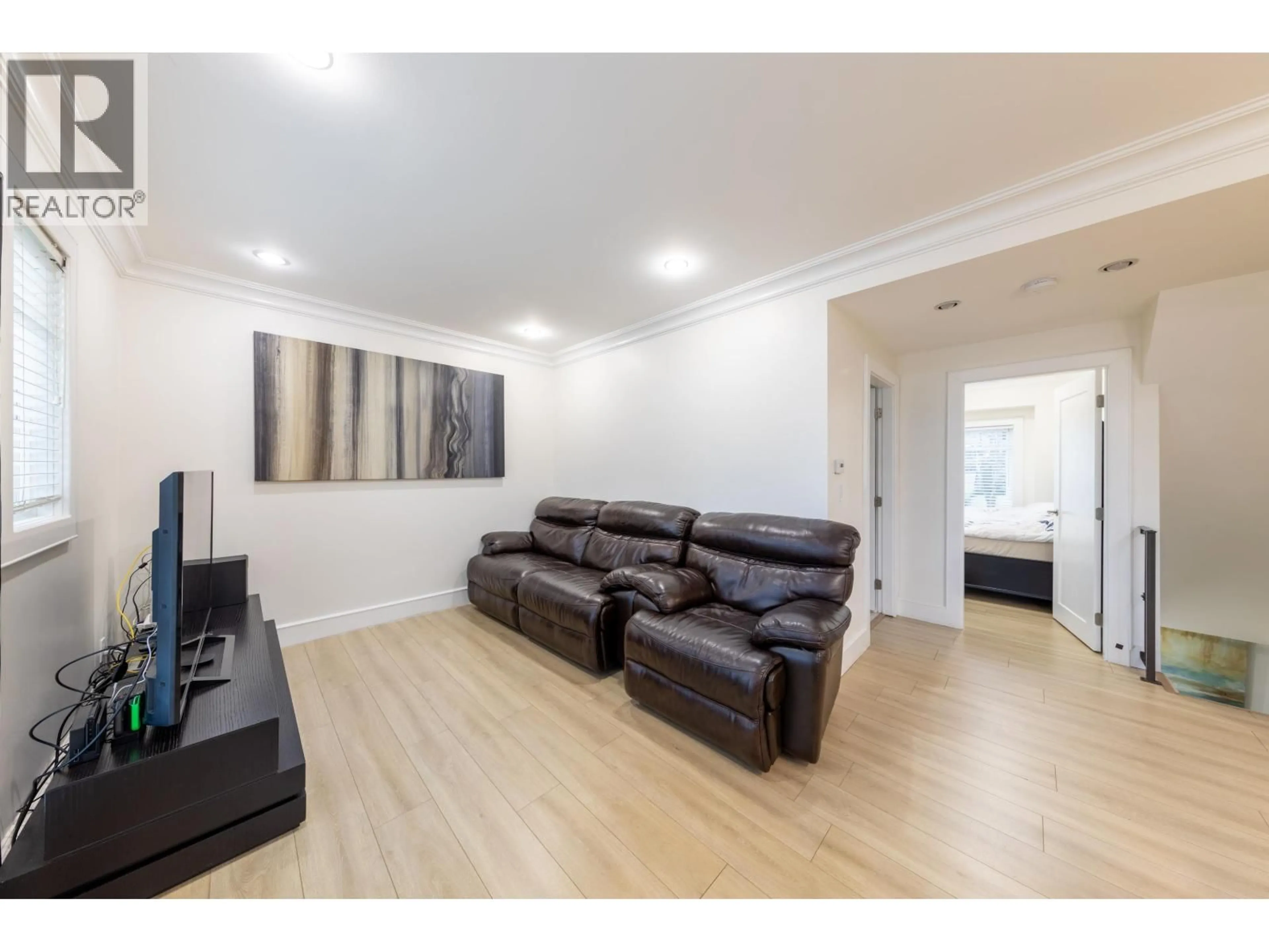 Living room with furniture, wood/laminate floor for 3389 21ST AVENUE, Vancouver British Columbia V6S1G8