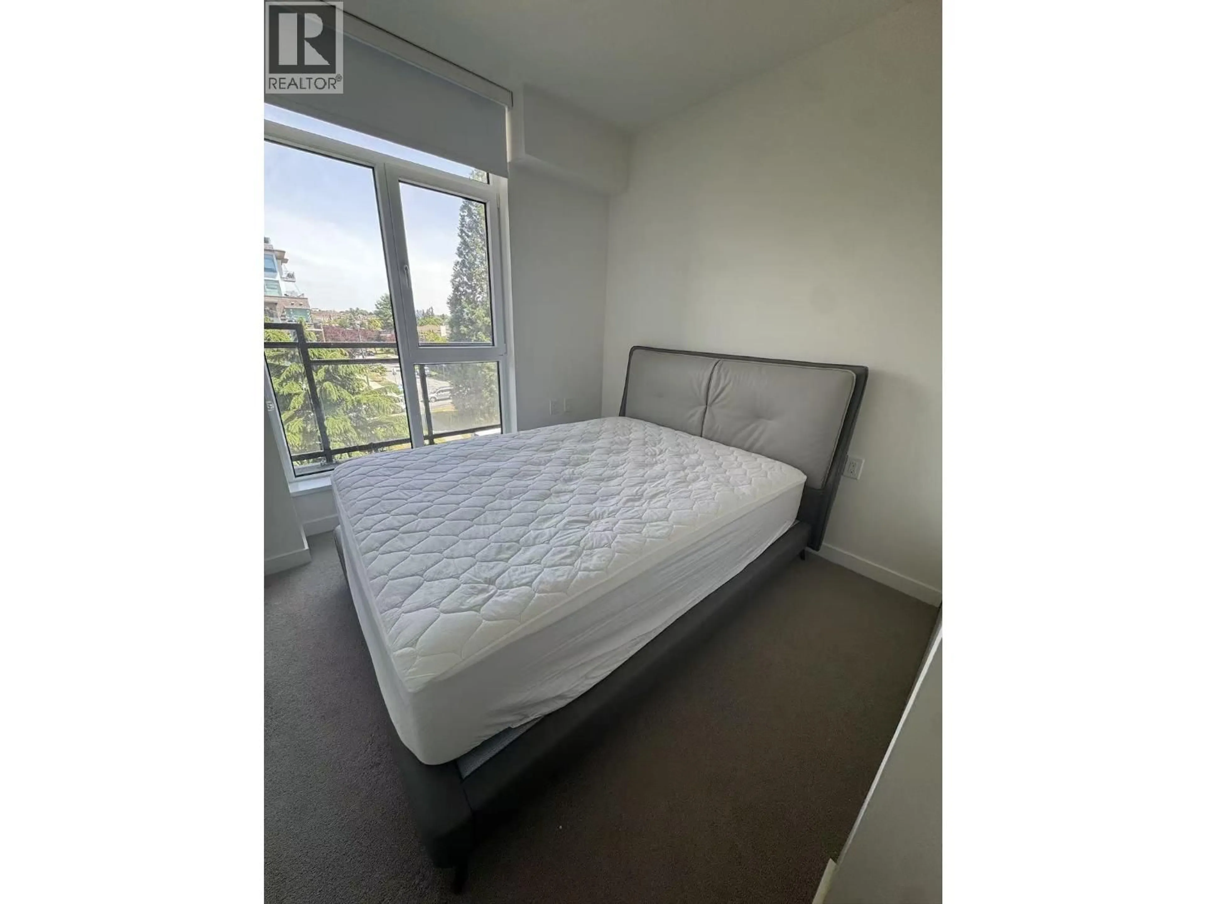 Bedroom with bed, unknown for 402 - 4189 CAMBIE STREET, Vancouver British Columbia V5Z2Y2