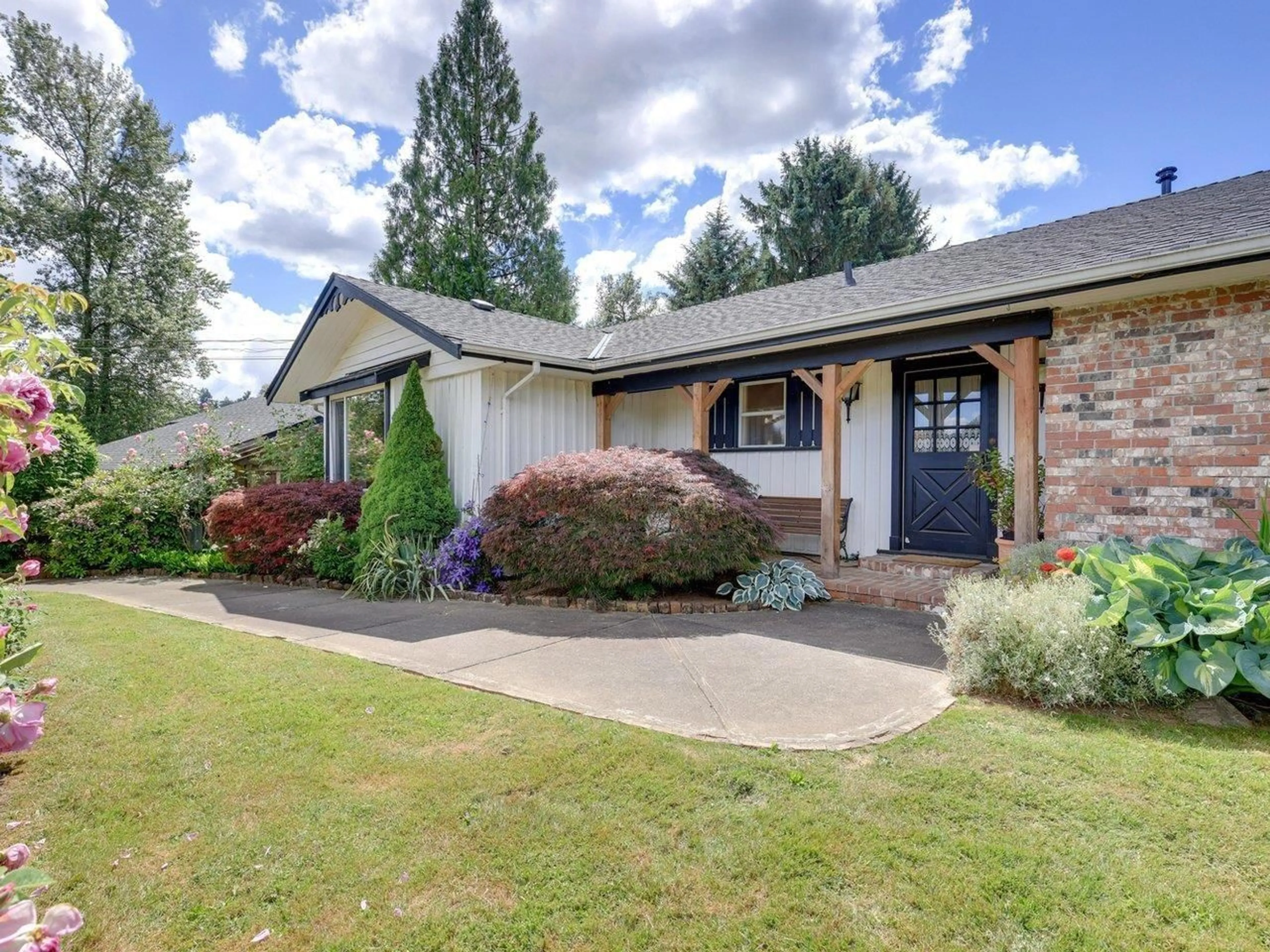 Home with brick exterior material, street for 8131 252 STREET, Langley British Columbia V1M3N1