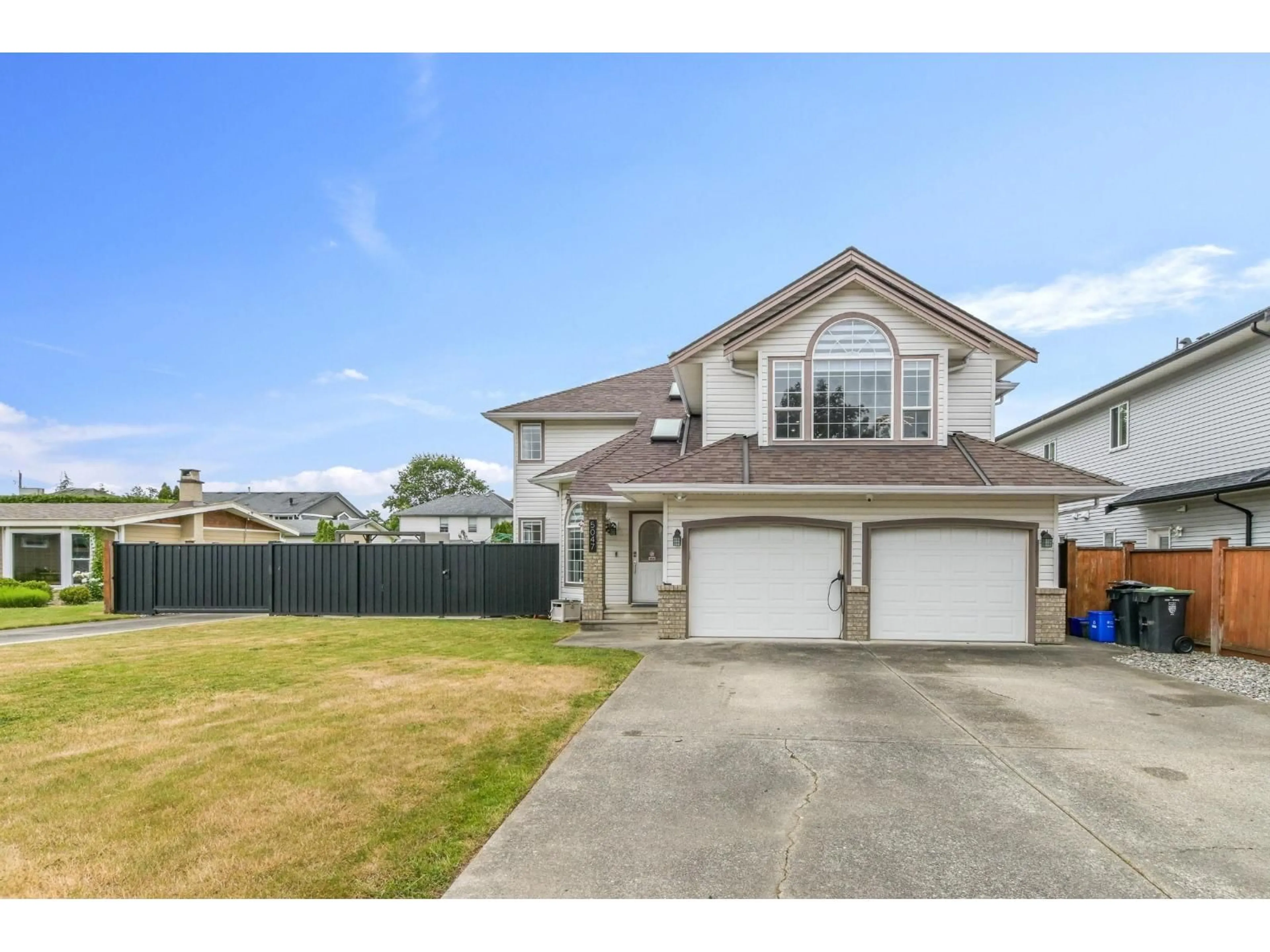 A pic from outside/outdoor area/front of a property/back of a property/a pic from drone, street for 5047 215 STREET, Langley British Columbia V3A5B9