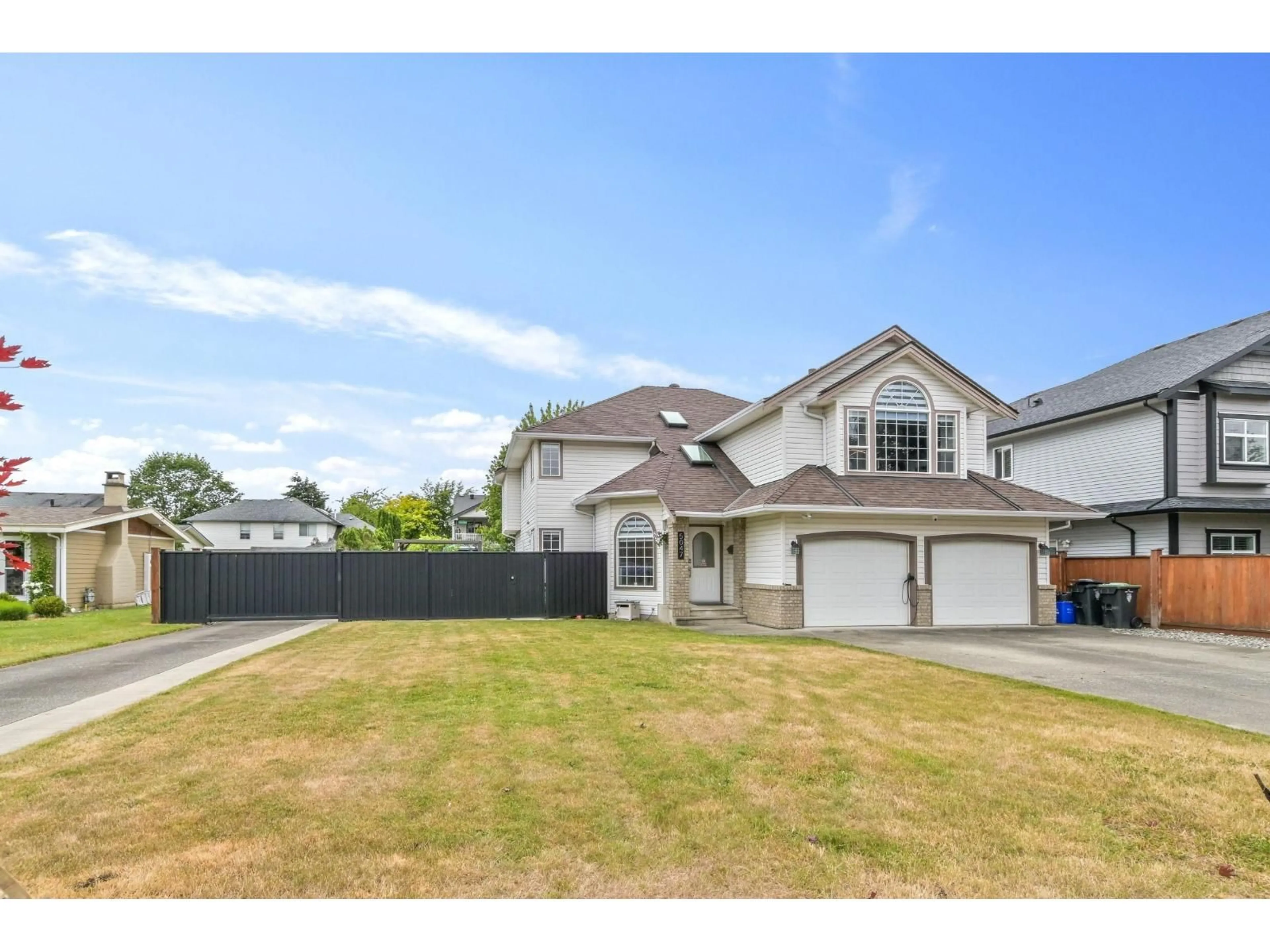 A pic from outside/outdoor area/front of a property/back of a property/a pic from drone, street for 5047 215 STREET, Langley British Columbia V3A5B9