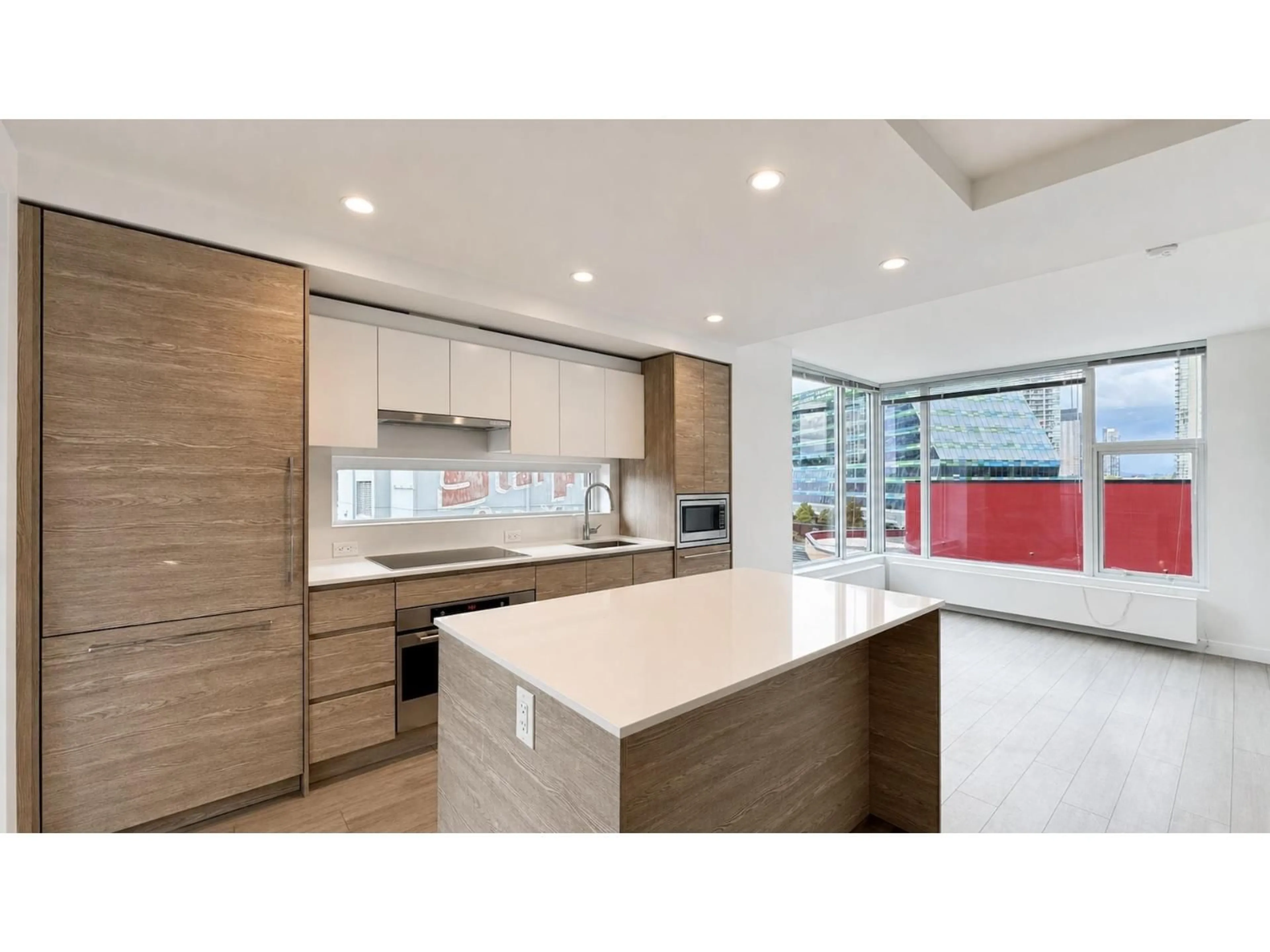 Open concept kitchen, unknown for 404 - 13655 FRASER HIGHWAY, Surrey British Columbia V3T0P8