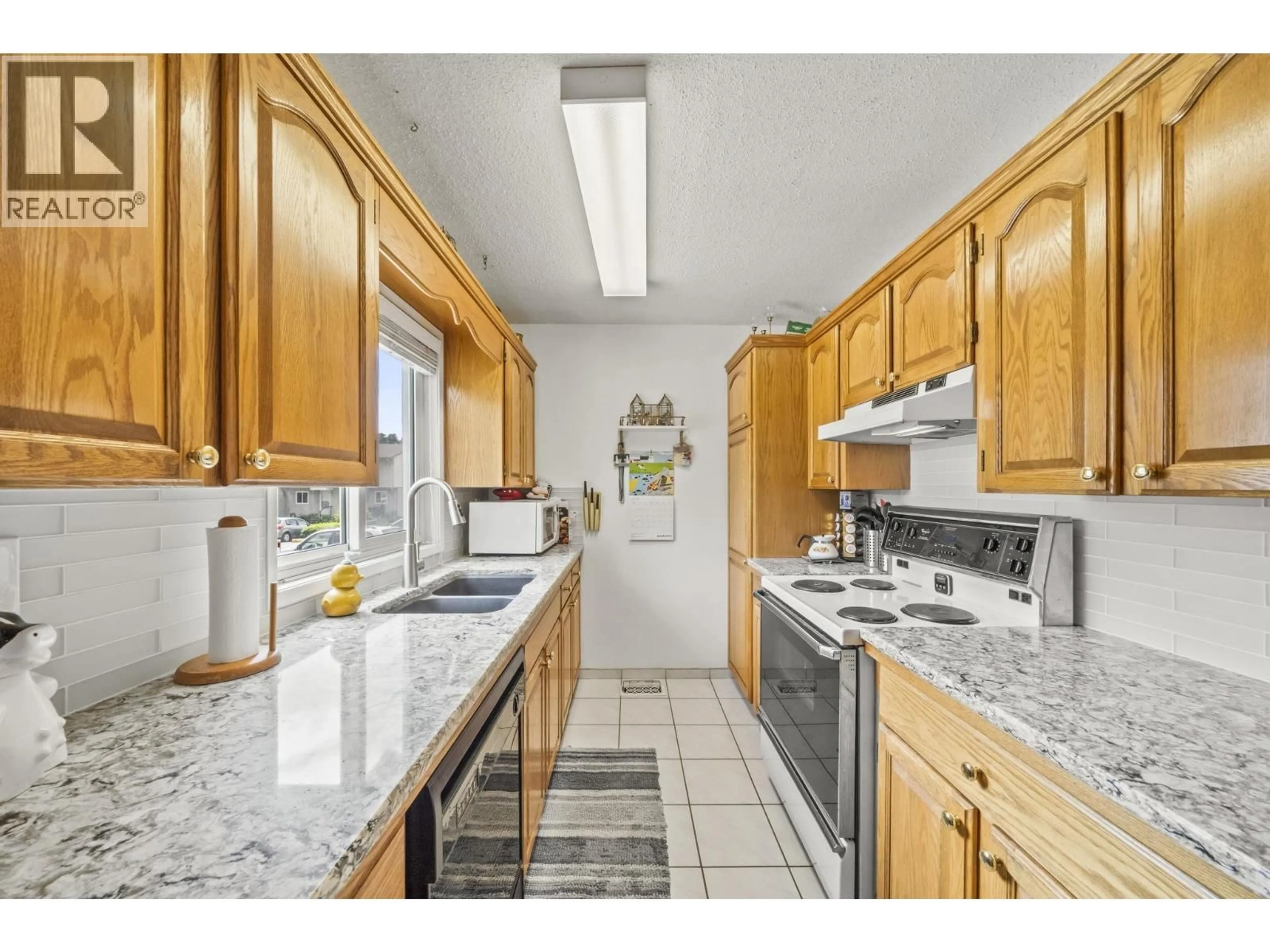 Standard kitchen, ceramic/tile floor for 5 - 3550 49TH AVENUE, Vancouver British Columbia V5S1M4