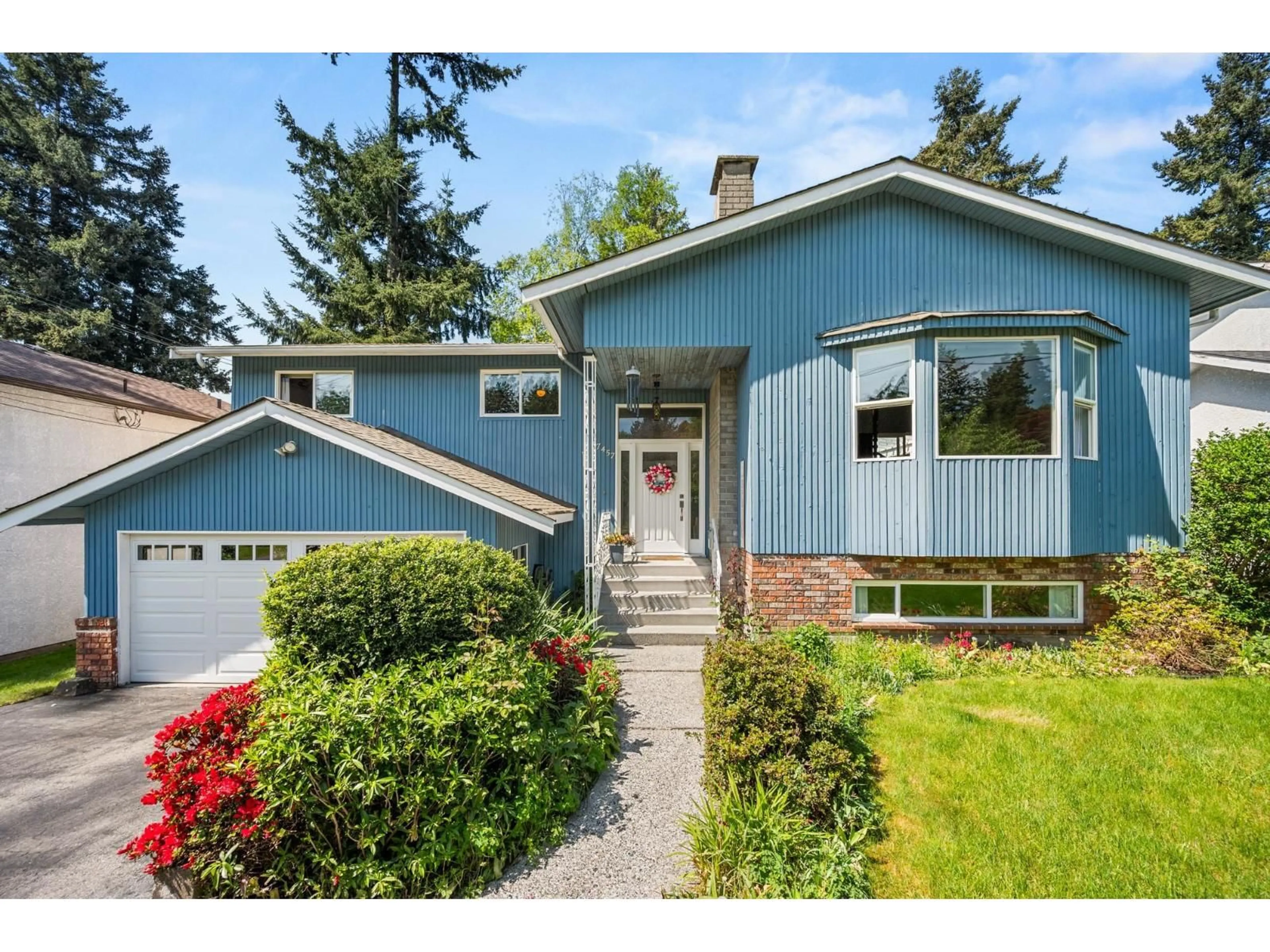 Home with vinyl exterior material, street for 7457 MINSTER DR. WEST, Delta British Columbia V4C4L8