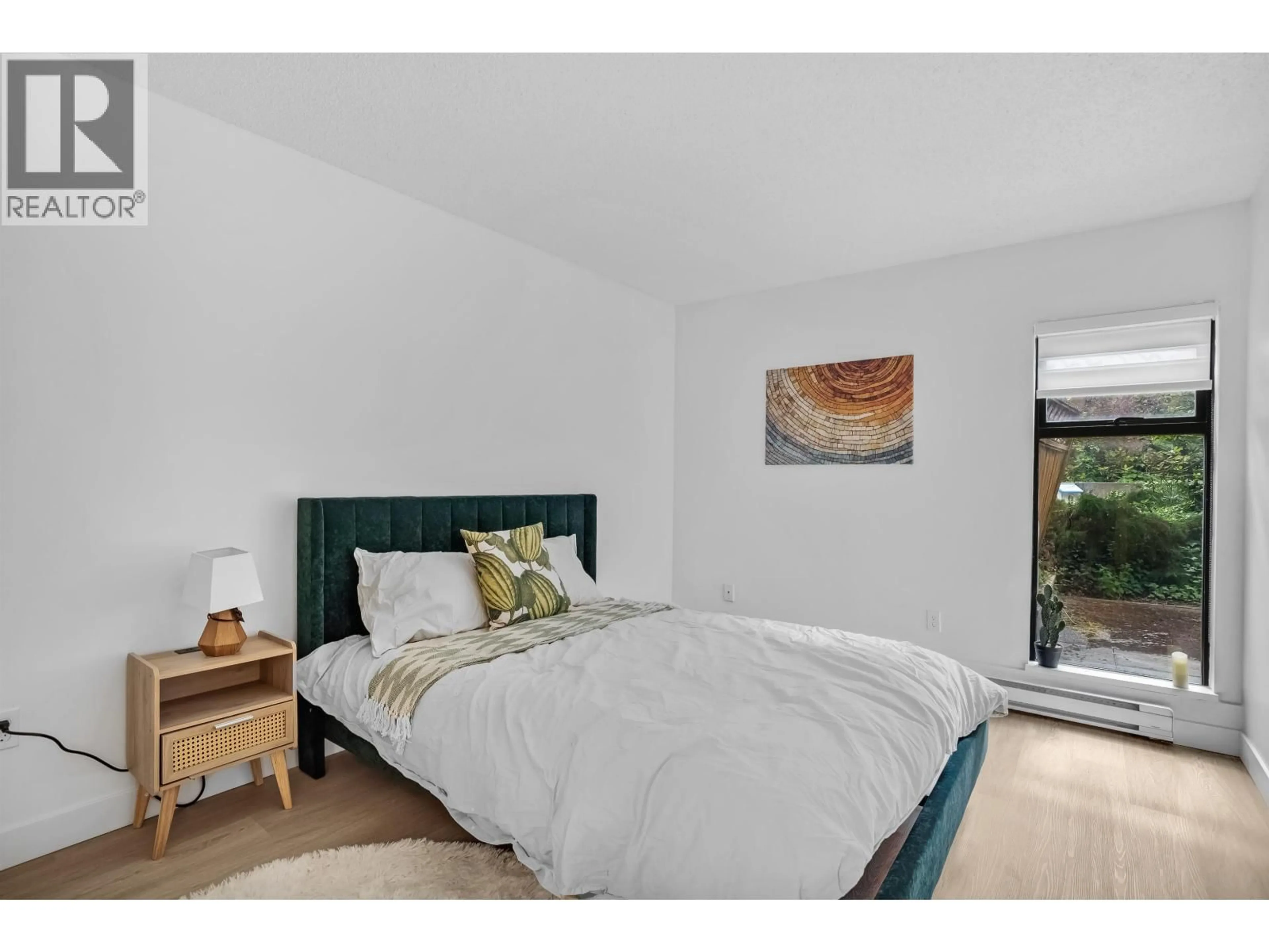 Bedroom with bed, unknown for 111 - 6931 COONEY ROAD, Richmond British Columbia V6Y2J9