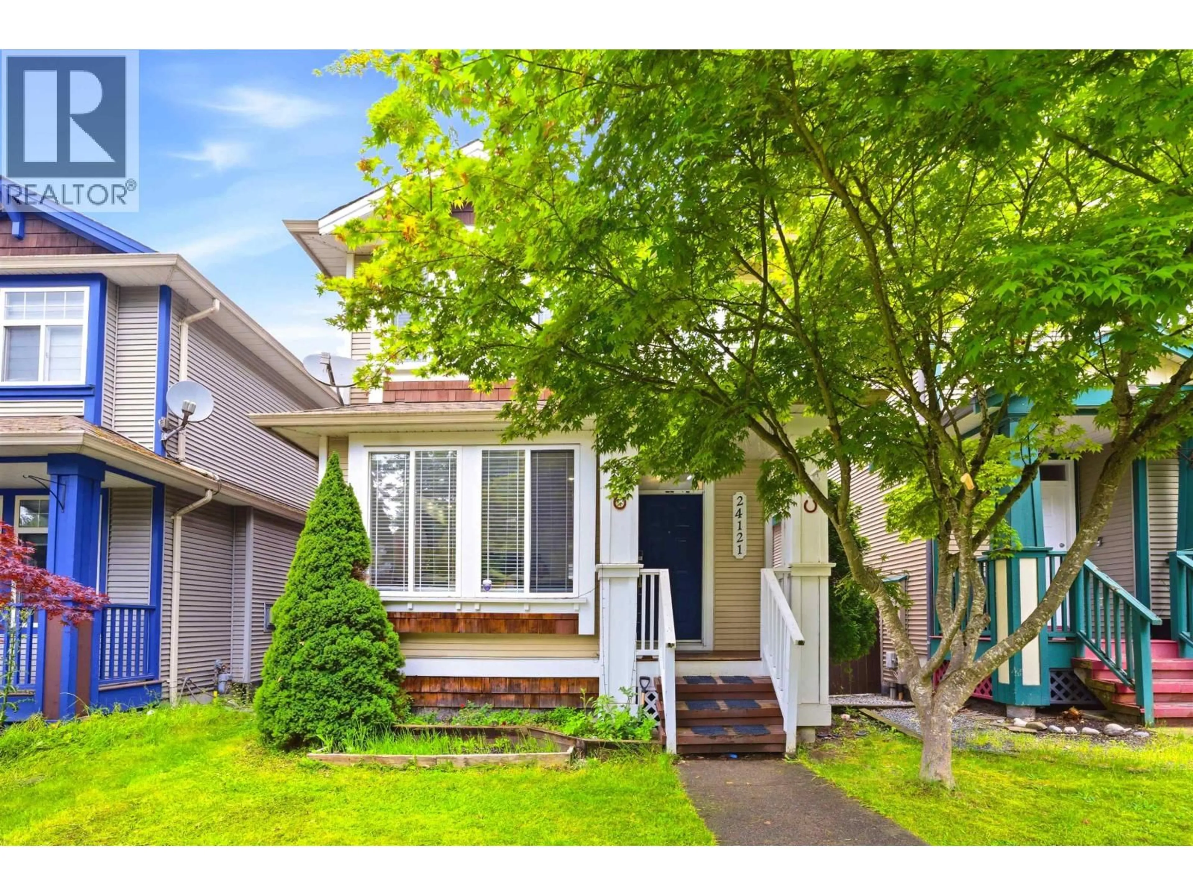 Home with vinyl exterior material, street for 24121 102ND AVENUE, Maple Ridge British Columbia V2W2A2