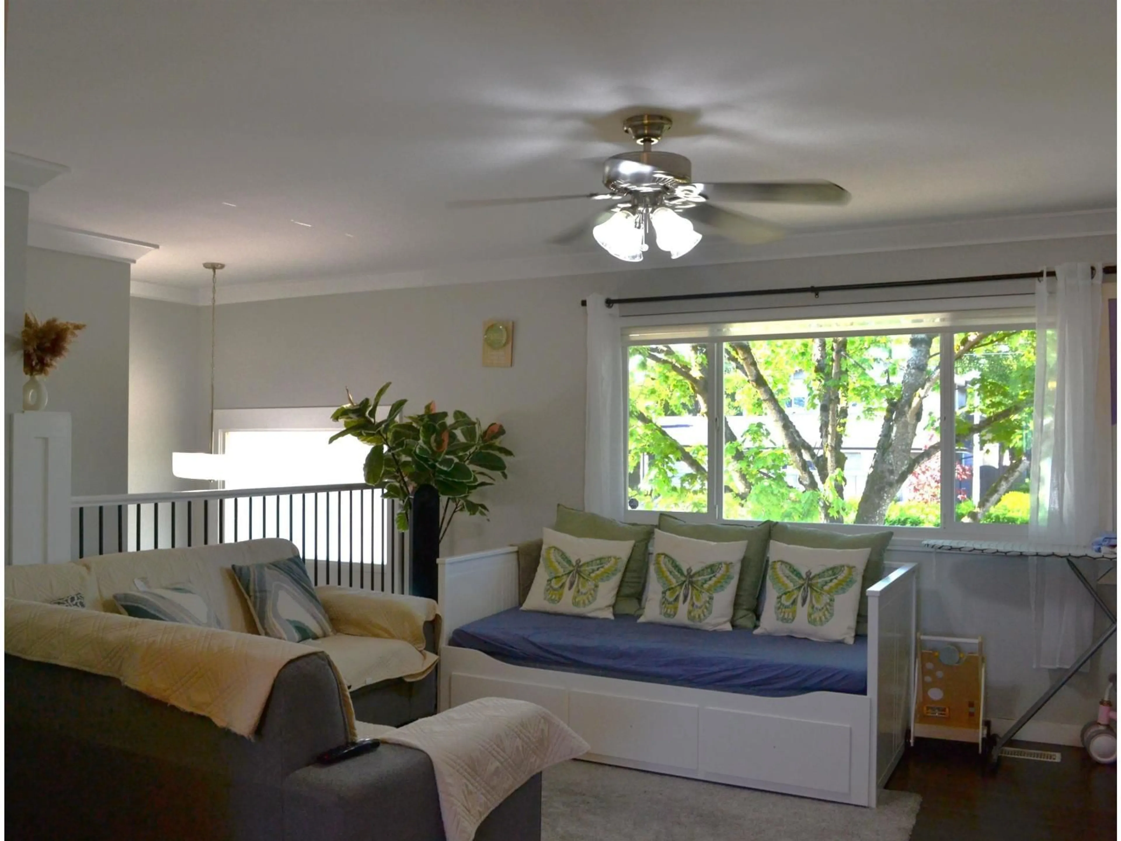 Living room with furniture, wood/laminate floor for 17486 61A AVENUE, Surrey British Columbia V3S5K2