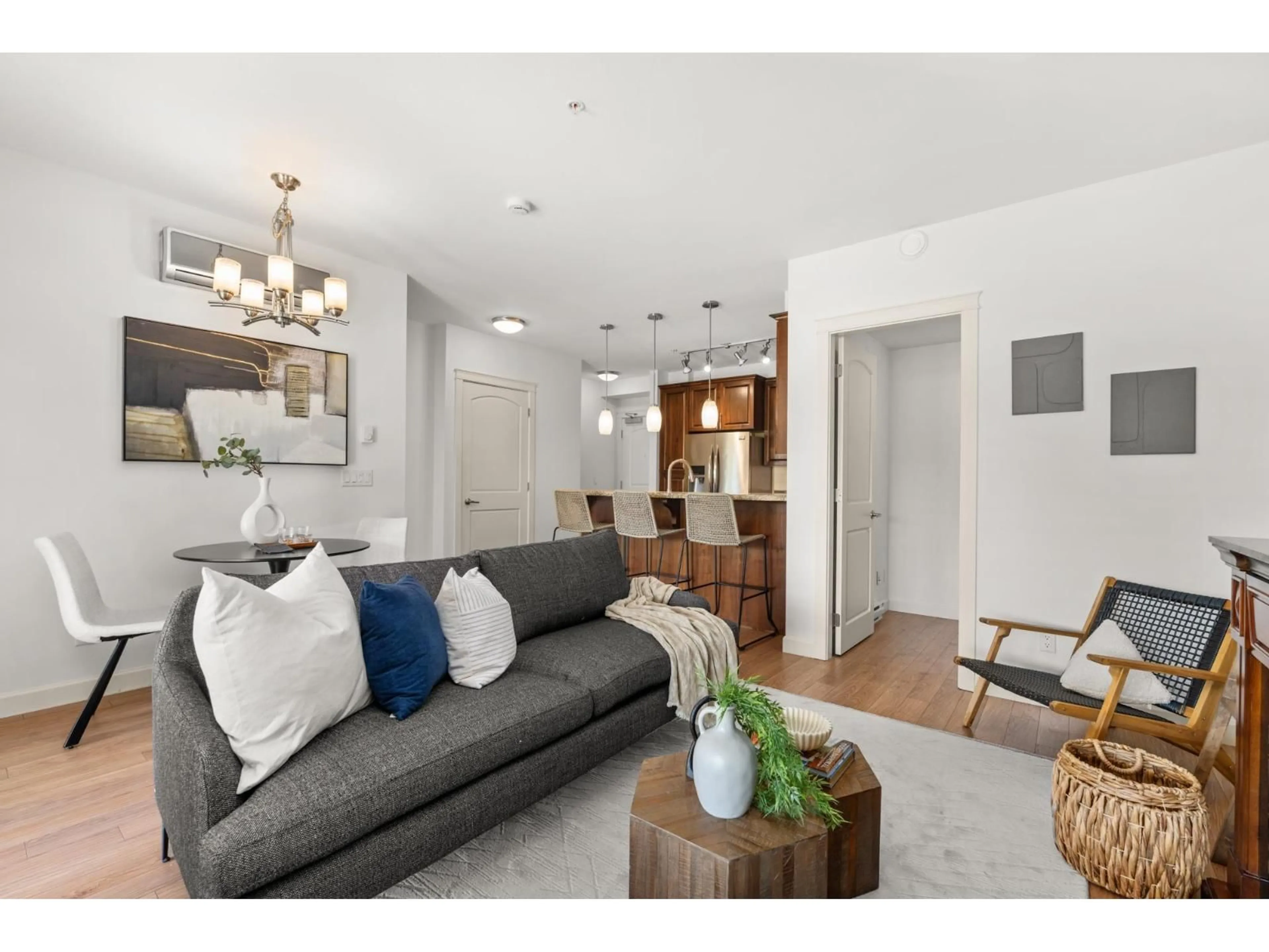 Living room with furniture, unknown for 202 - 2860 TRETHEWEY STREET, Abbotsford British Columbia V2T0G5