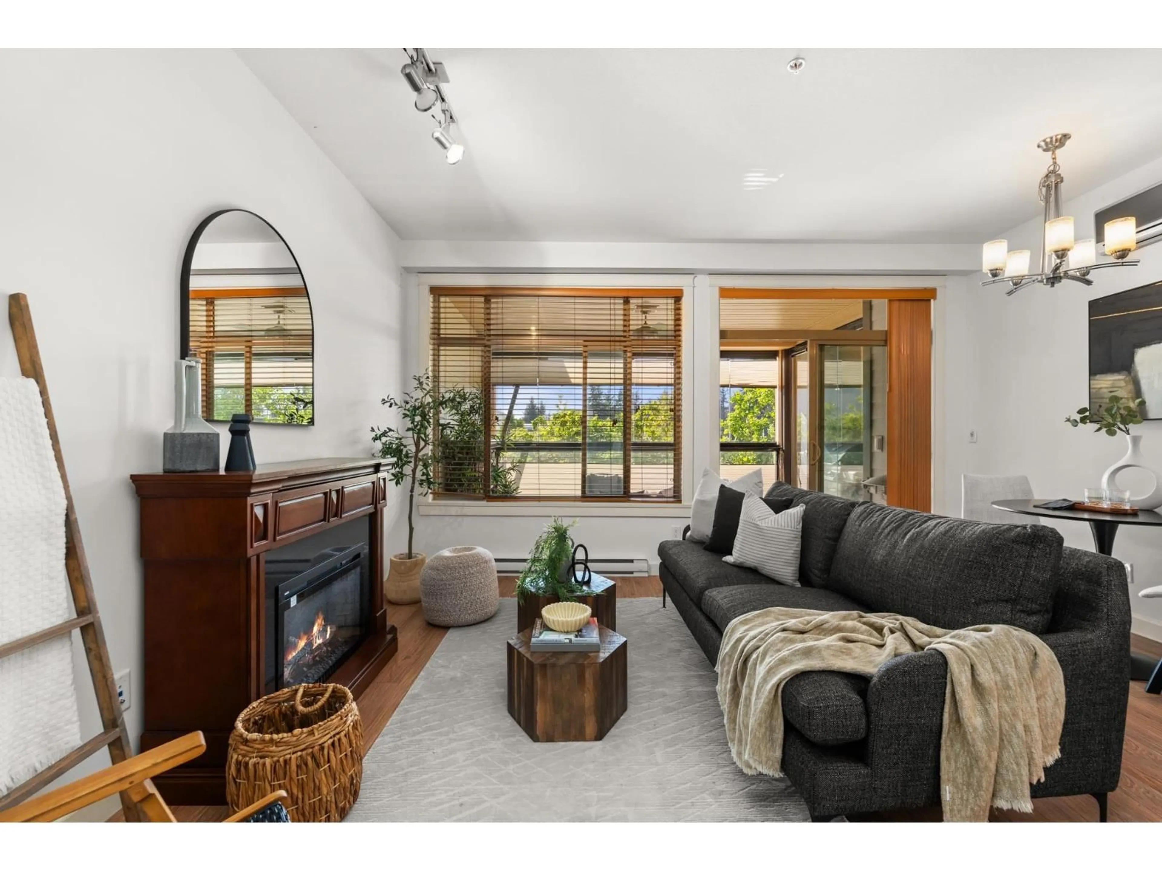 Living room with furniture, unknown for 202 - 2860 TRETHEWEY STREET, Abbotsford British Columbia V2T0G5