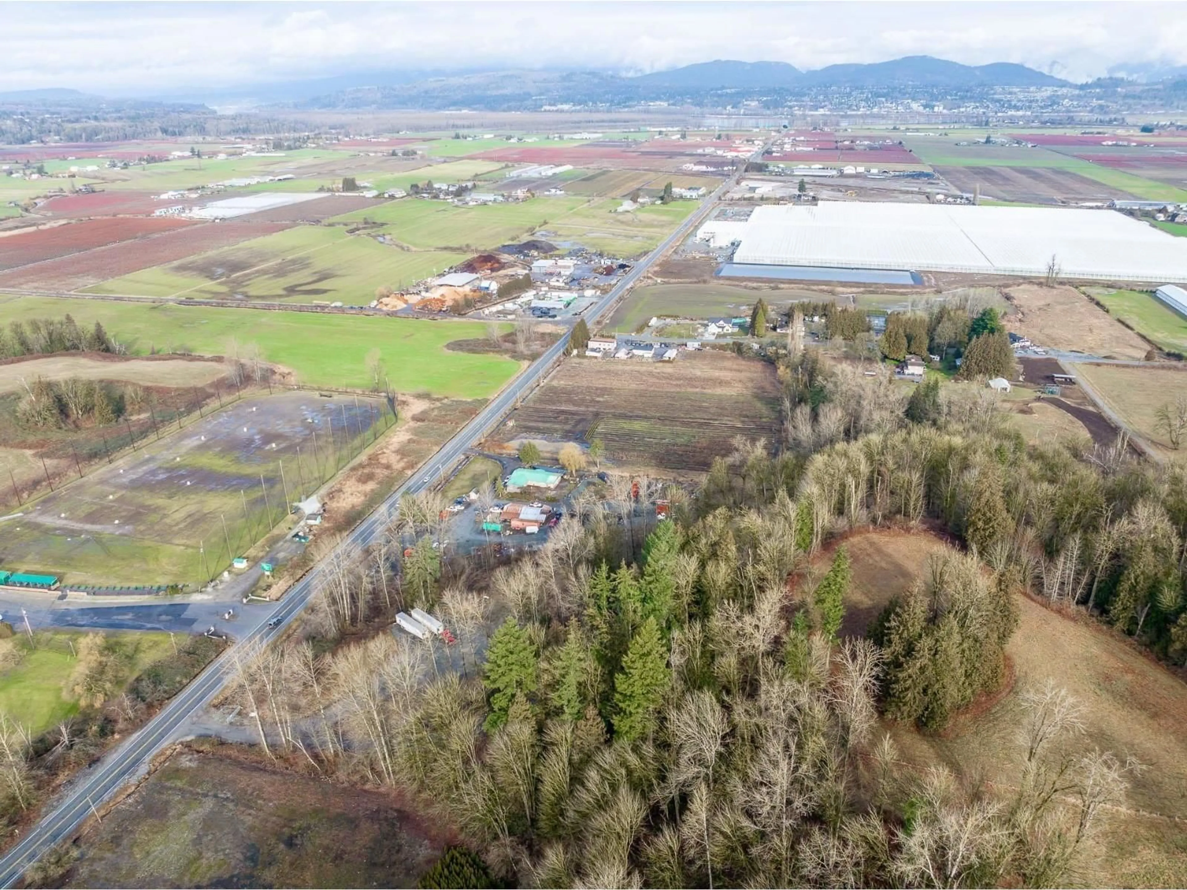 A pic from outside/outdoor area/front of a property/back of a property/a pic from drone, mountain view for 4210 GLADWIN ROAD, Abbotsford British Columbia V4X1W6