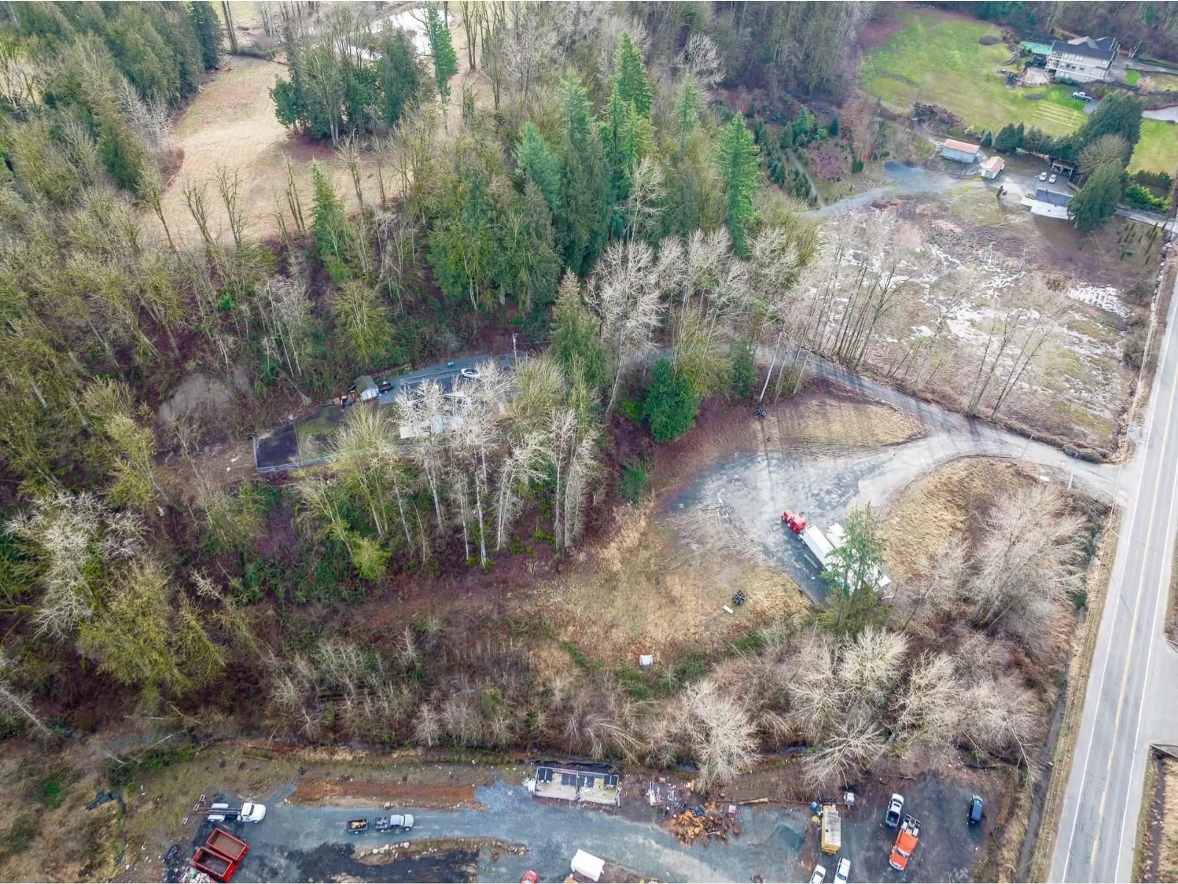 A pic from outside/outdoor area/front of a property/back of a property/a pic from drone, forest/trees view for 4210 GLADWIN ROAD, Abbotsford British Columbia V4X1W6