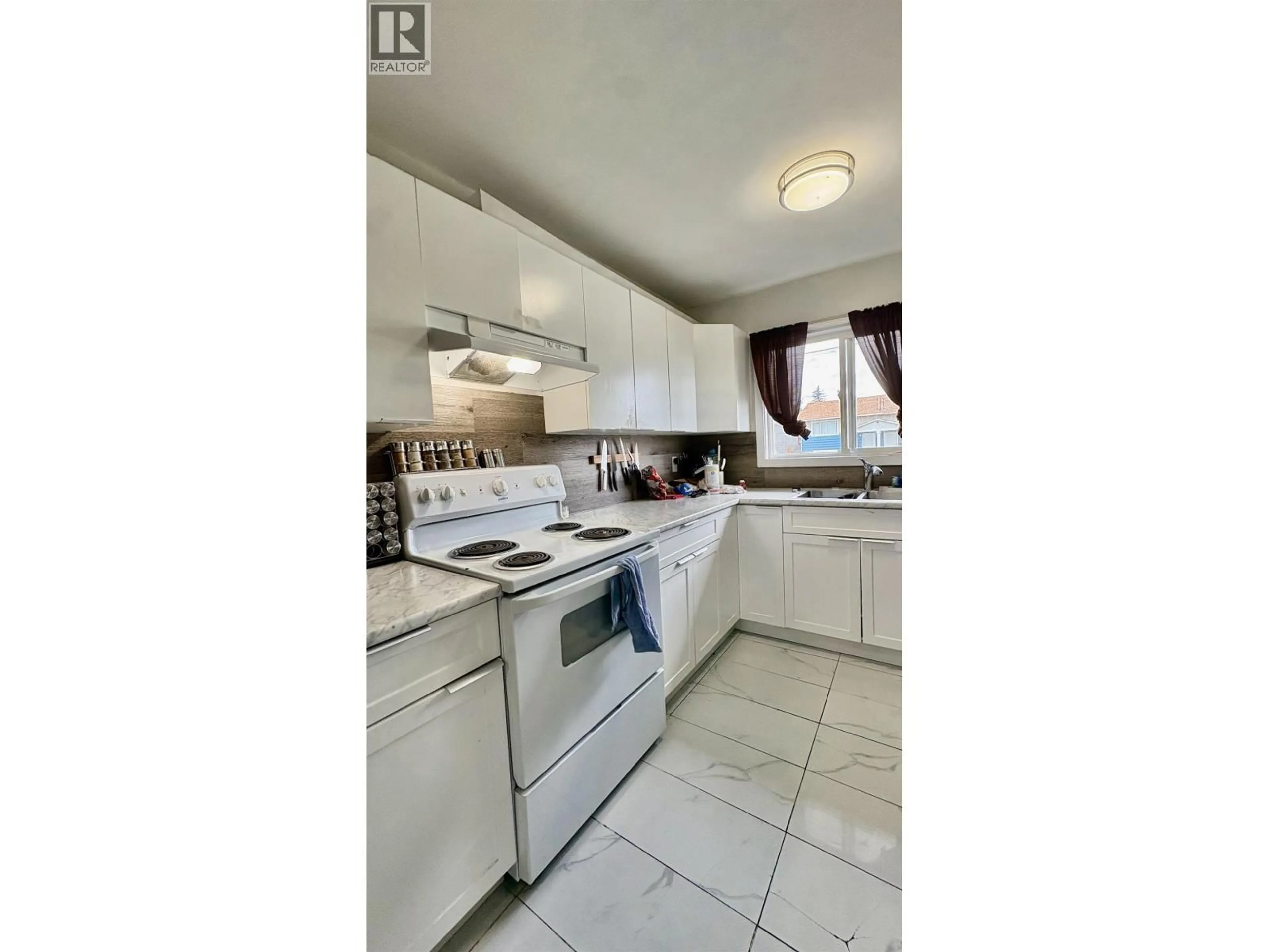 Standard kitchen, ceramic/tile floor for 2124 QUINCE STREET, Prince George British Columbia V2L2H1