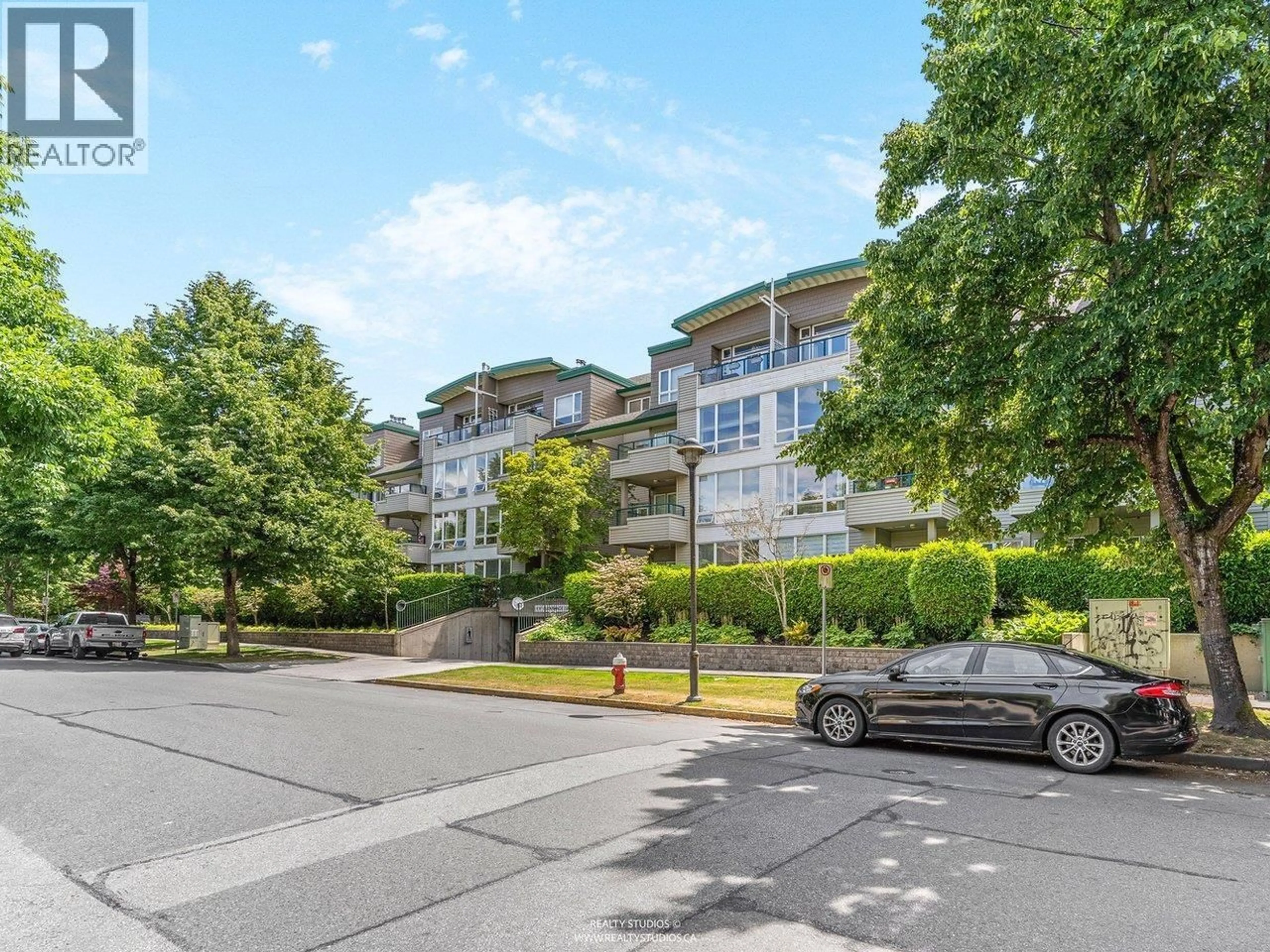 A pic from outside/outdoor area/front of a property/back of a property/a pic from drone, street for 111 - 5800 ANDREWS ROAD, Richmond British Columbia V7E6M2