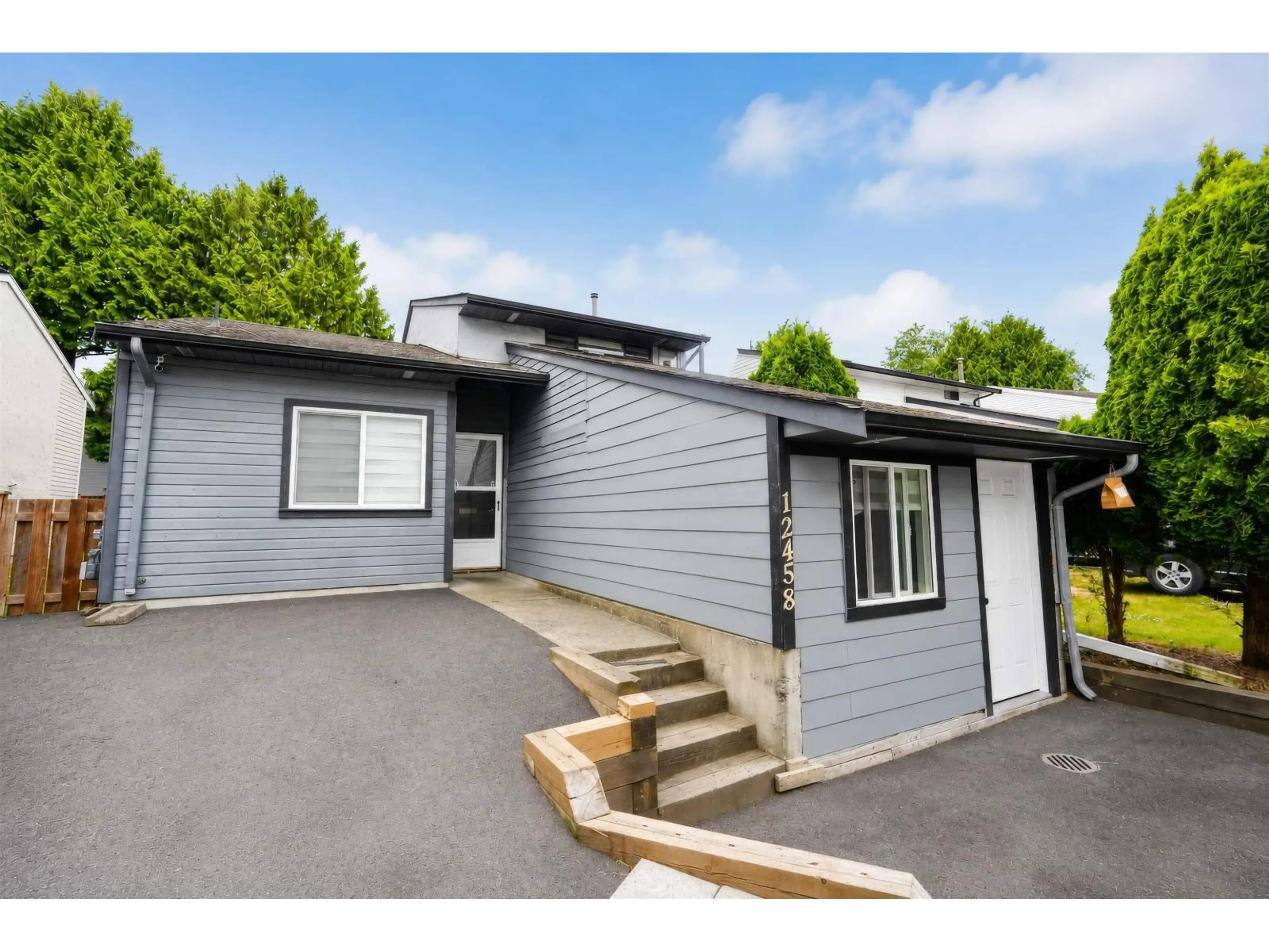 A pic from outside/outdoor area/front of a property/back of a property/a pic from drone, street for 12458 76B AVENUE, Surrey British Columbia V3W7W6