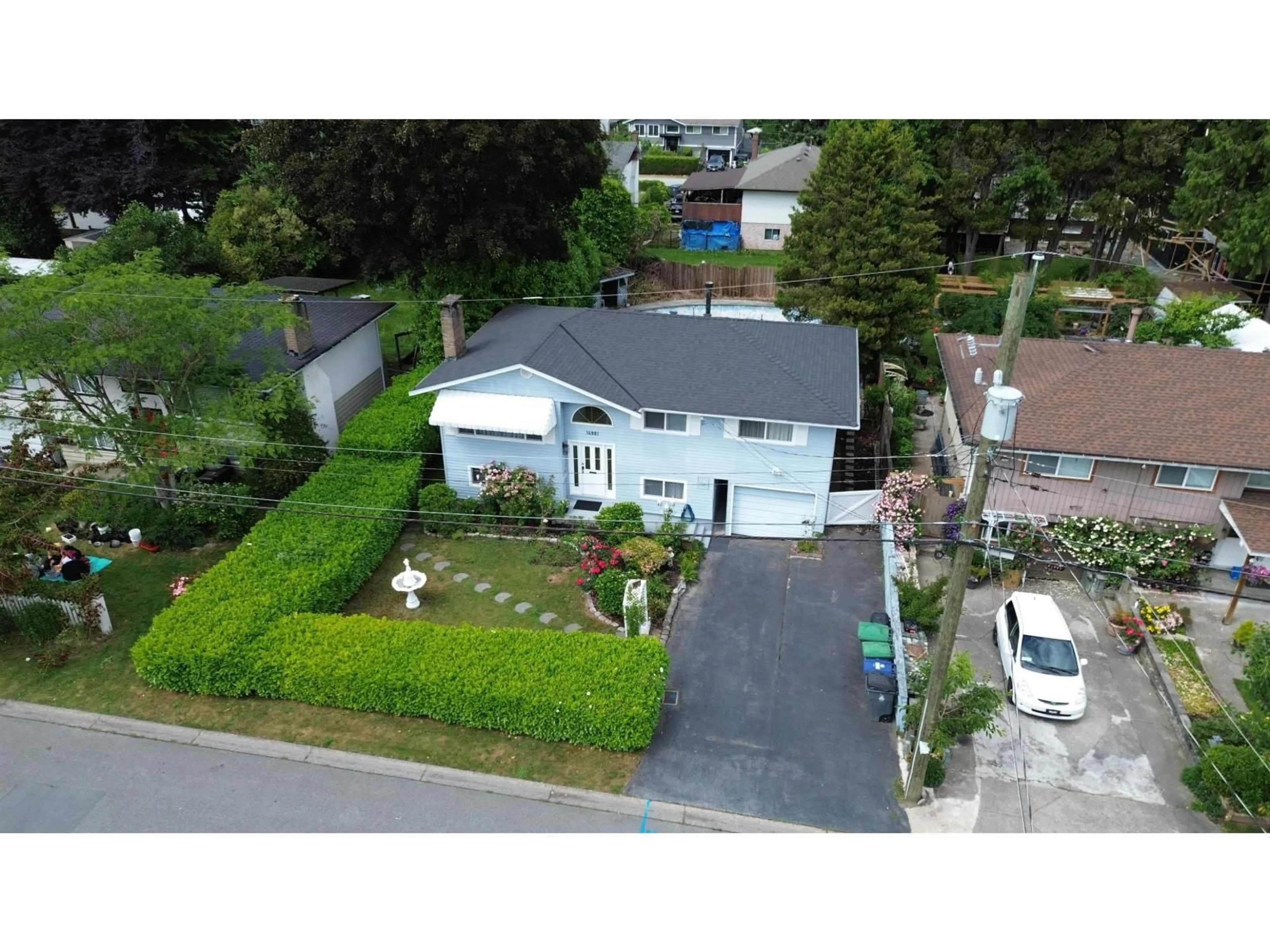 A pic from outside/outdoor area/front of a property/back of a property/a pic from drone, street for 14981 RAVEN PLACE, Surrey British Columbia V3R4T3