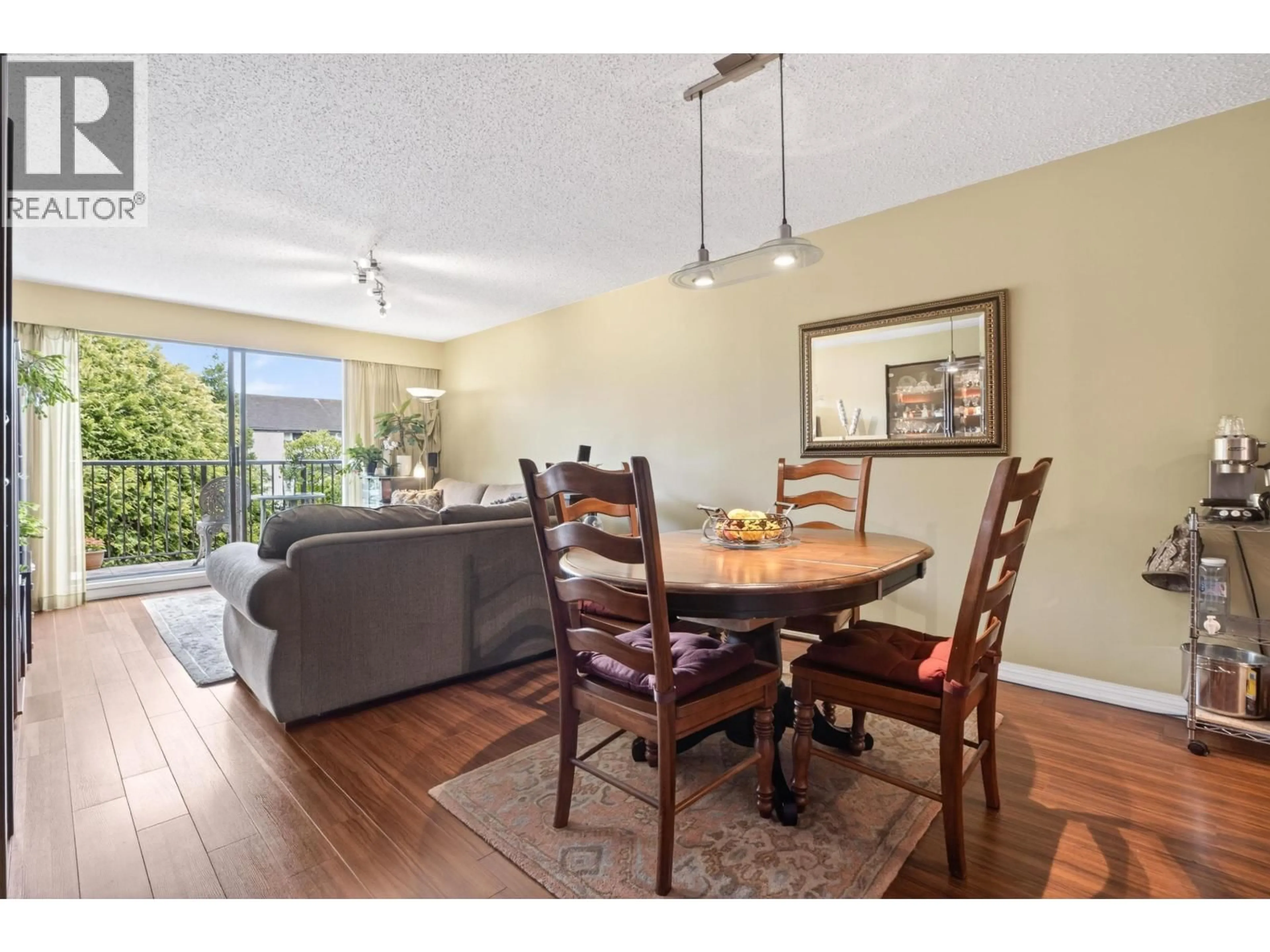 Dining room, wood/laminate floor for 105 - 236 2ND STREET, North Vancouver British Columbia V7M1C6
