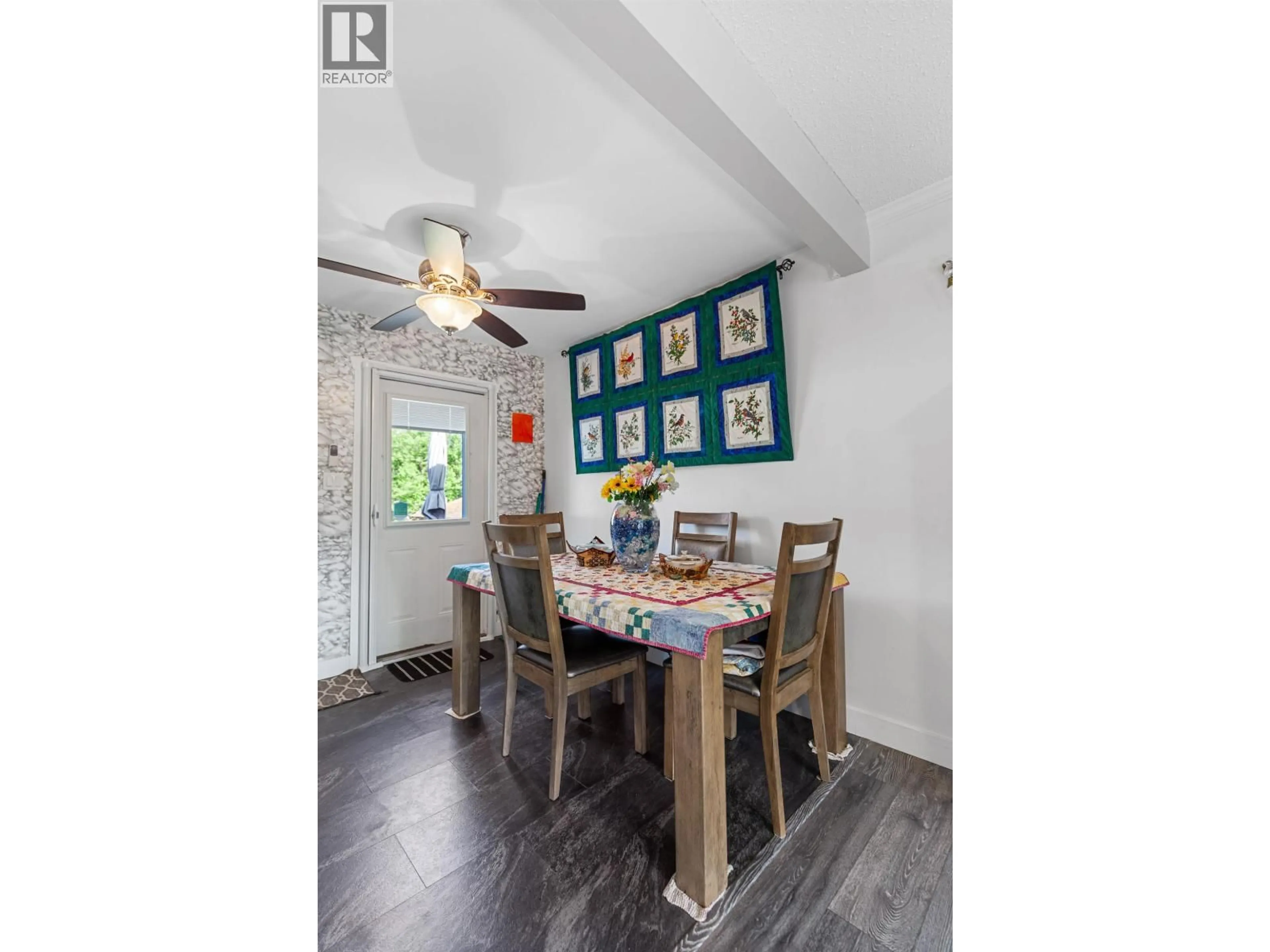 Dining room, wood/laminate floor for 8274 SPARROW ROAD, Prince George British Columbia V2K5H3