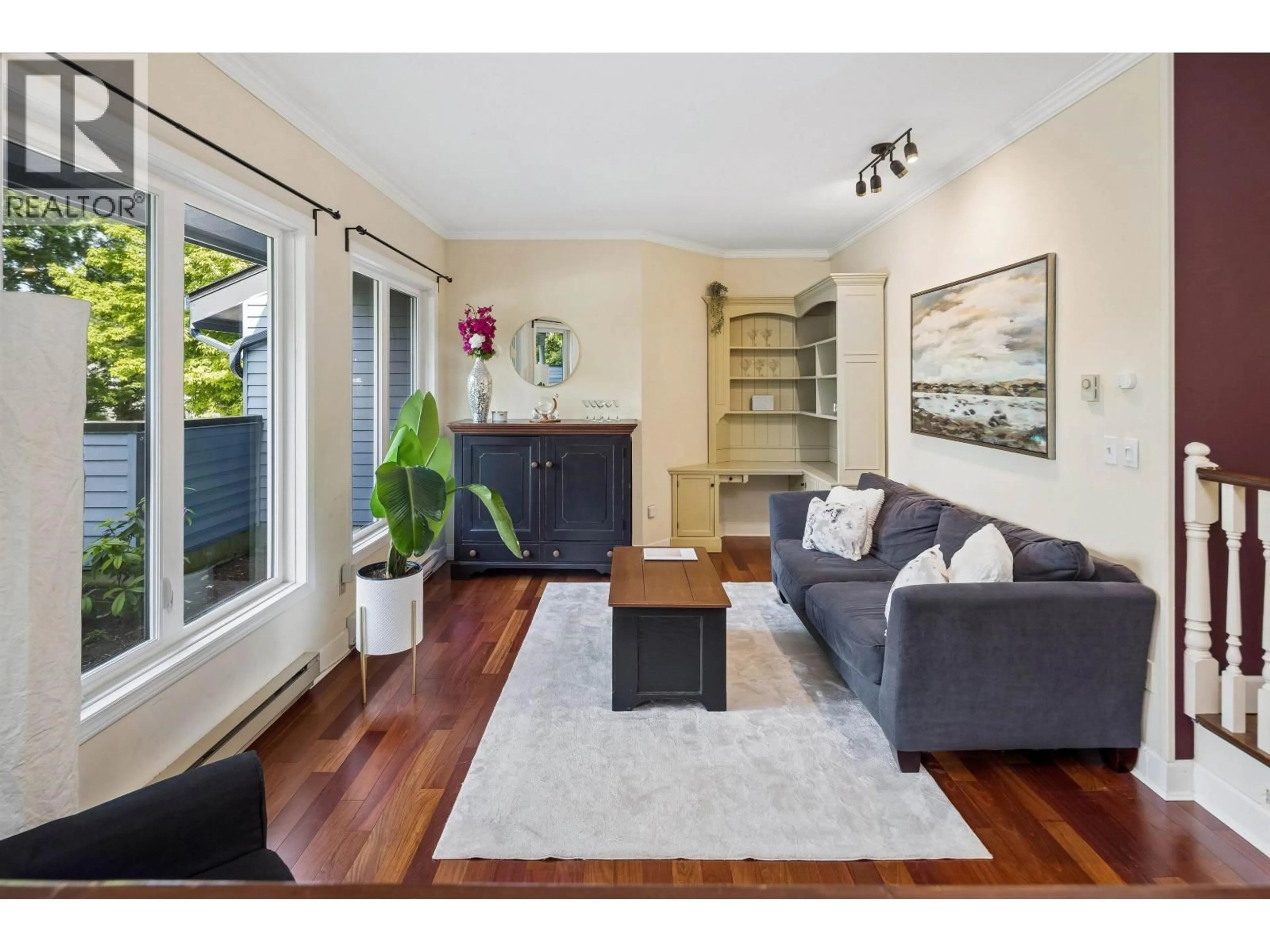 Living room with furniture, wood/laminate floor for 3 - 1620 BALSAM STREET, Vancouver British Columbia V6K3M1
