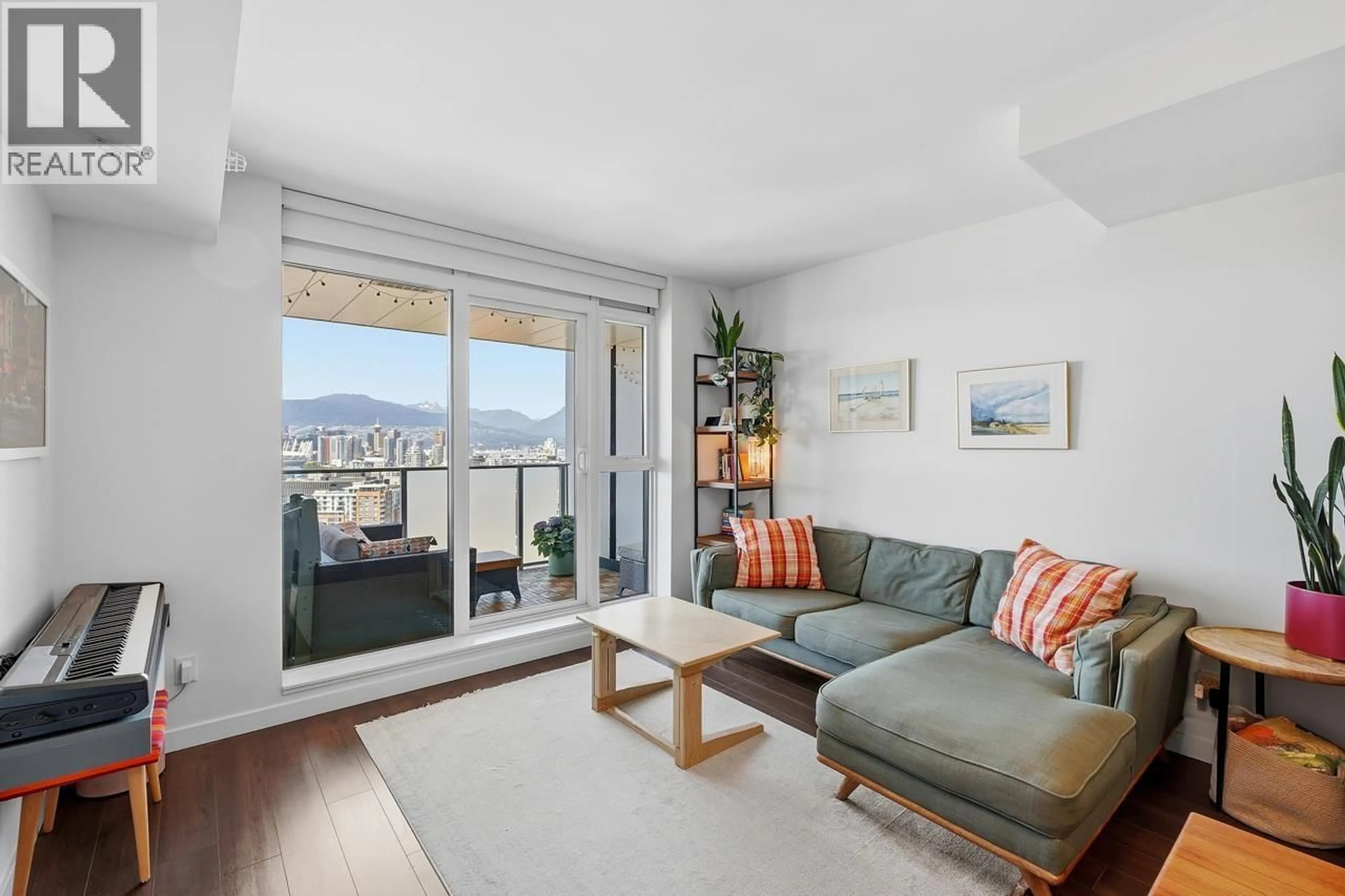 Living room with furniture, wood/laminate floor for 1711 - 285 10 AVENUE, Vancouver British Columbia V5T0H6