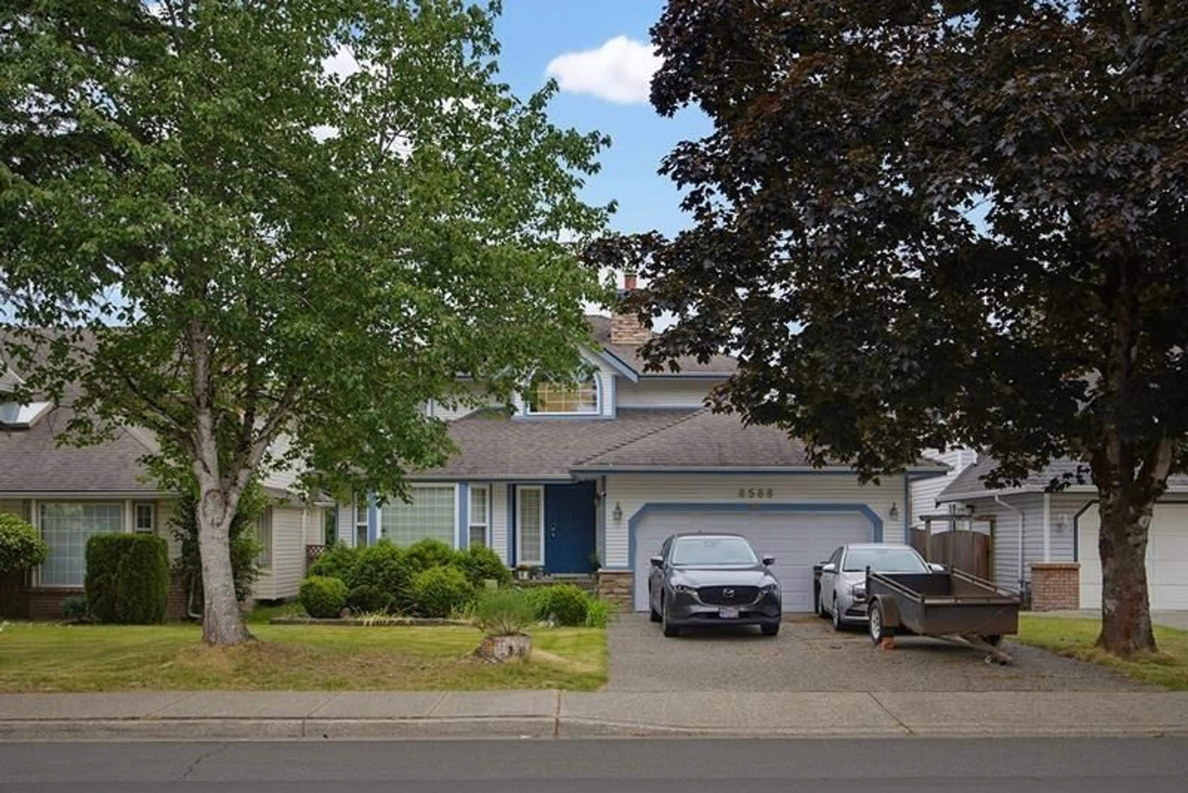 Home with vinyl exterior material, street for 8588 212 STREET, Langley British Columbia V1M2E7