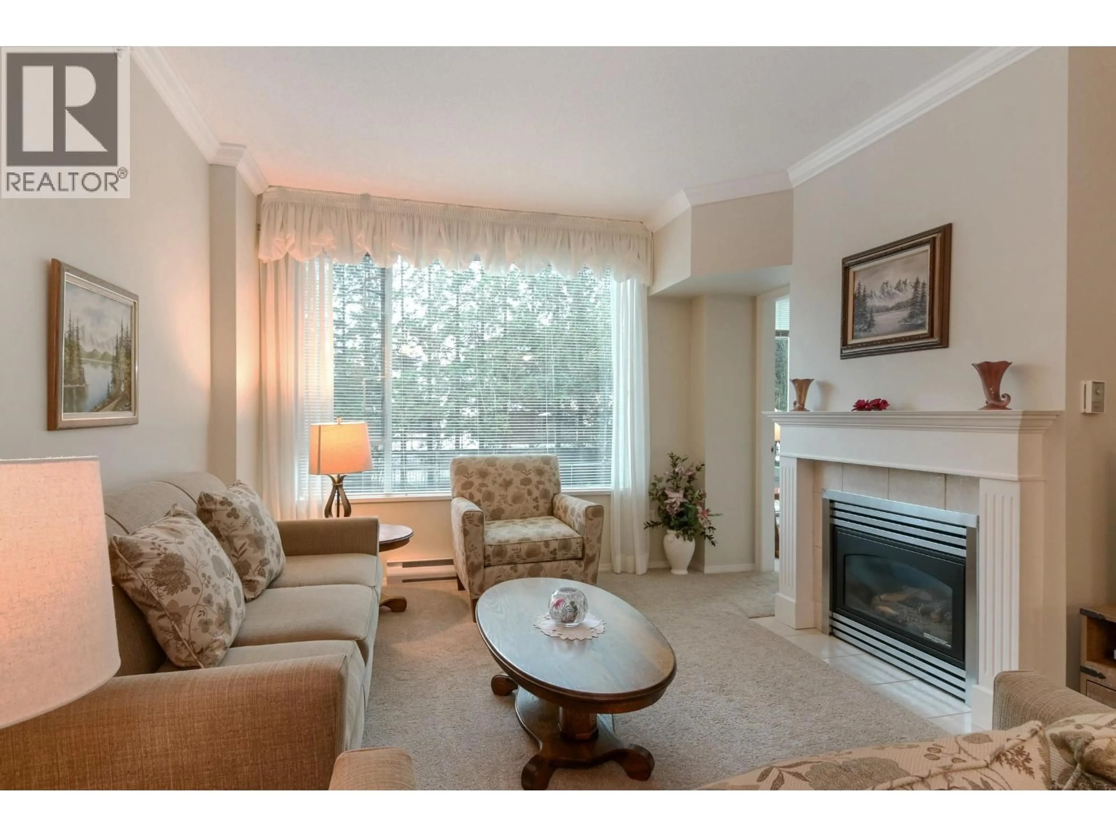 Living room with furniture, wood/laminate floor for 110 - 12148 224 STREET, Maple Ridge British Columbia V2X3N8