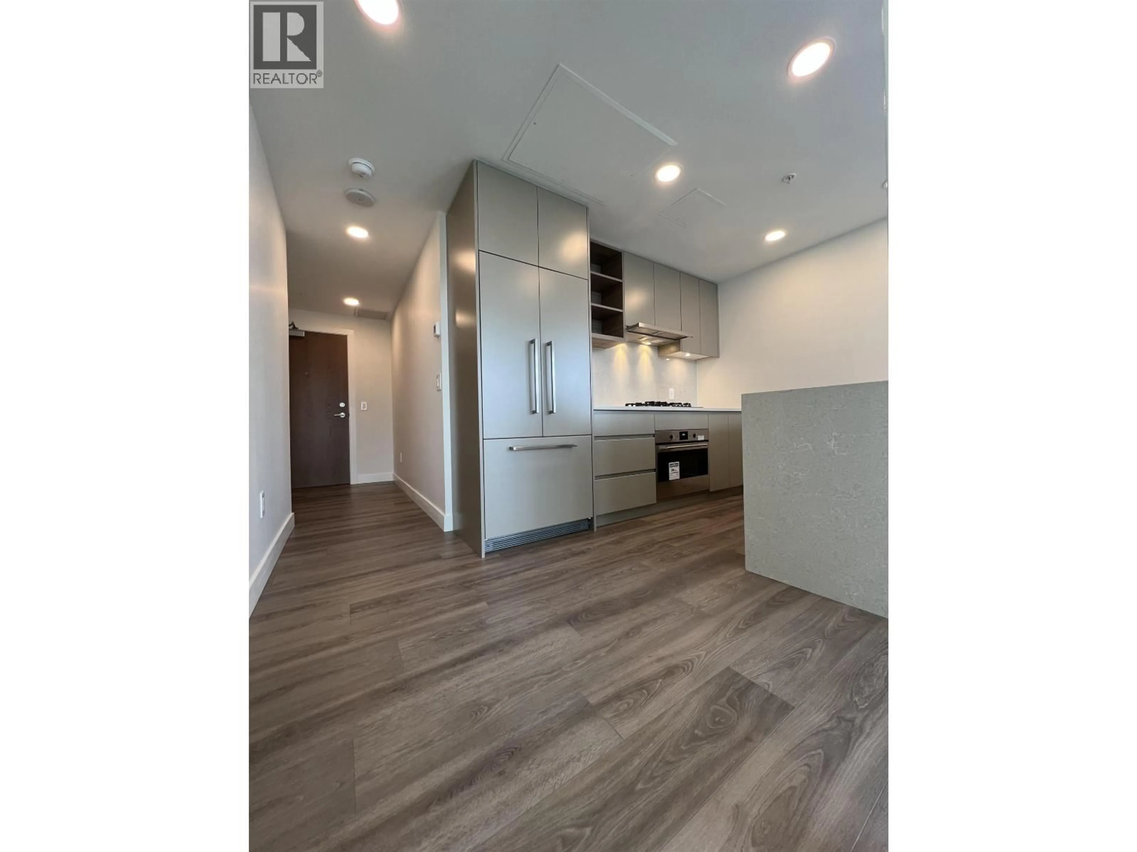 Open concept kitchen, wood/laminate floor for 1902 - 4433 ALASKA STREET, Burnaby British Columbia V5C5T3