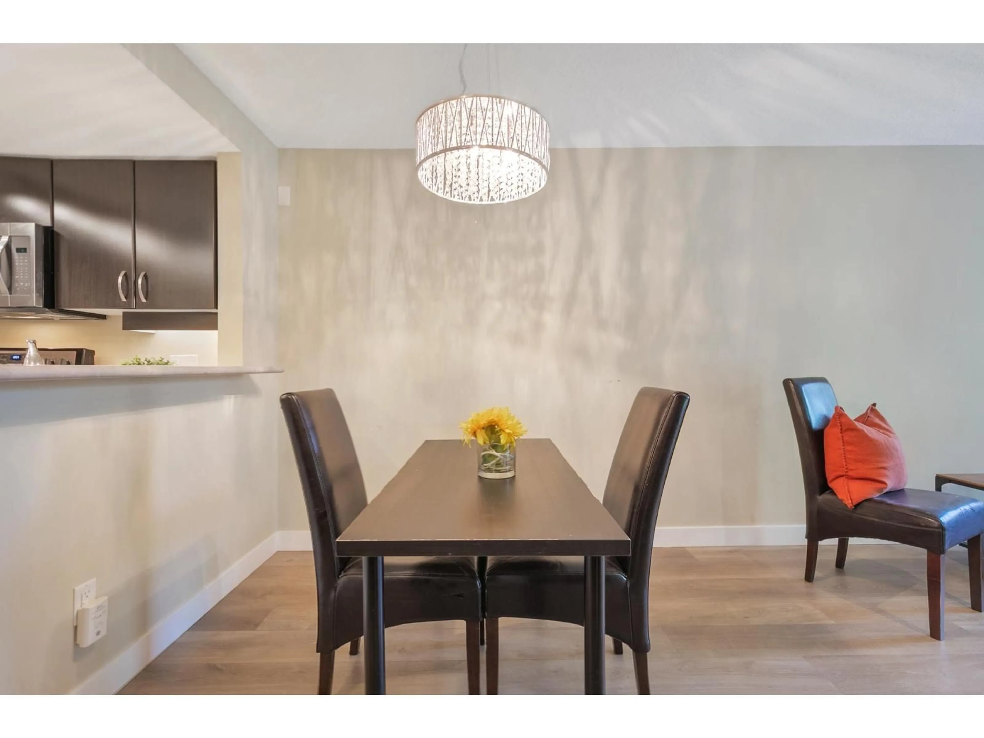 Dining room, wood/laminate floor for 334 - 10838 CITY PARKWAY, Surrey British Columbia V3T5X9
