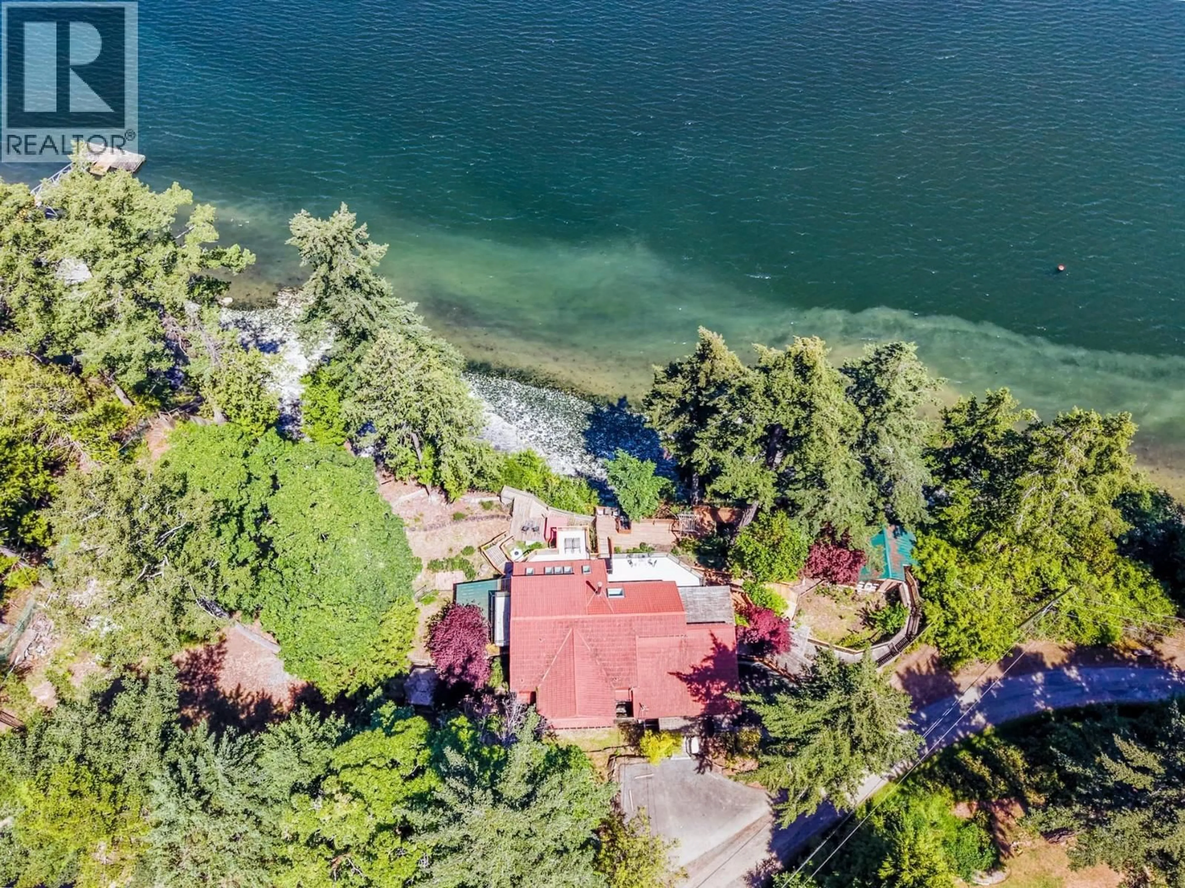 A pic from outside/outdoor area/front of a property/back of a property/a pic from drone, water/lake/river/ocean view for 7911 BEDWELL DRIVE, Pender Island British Columbia V0N2M2