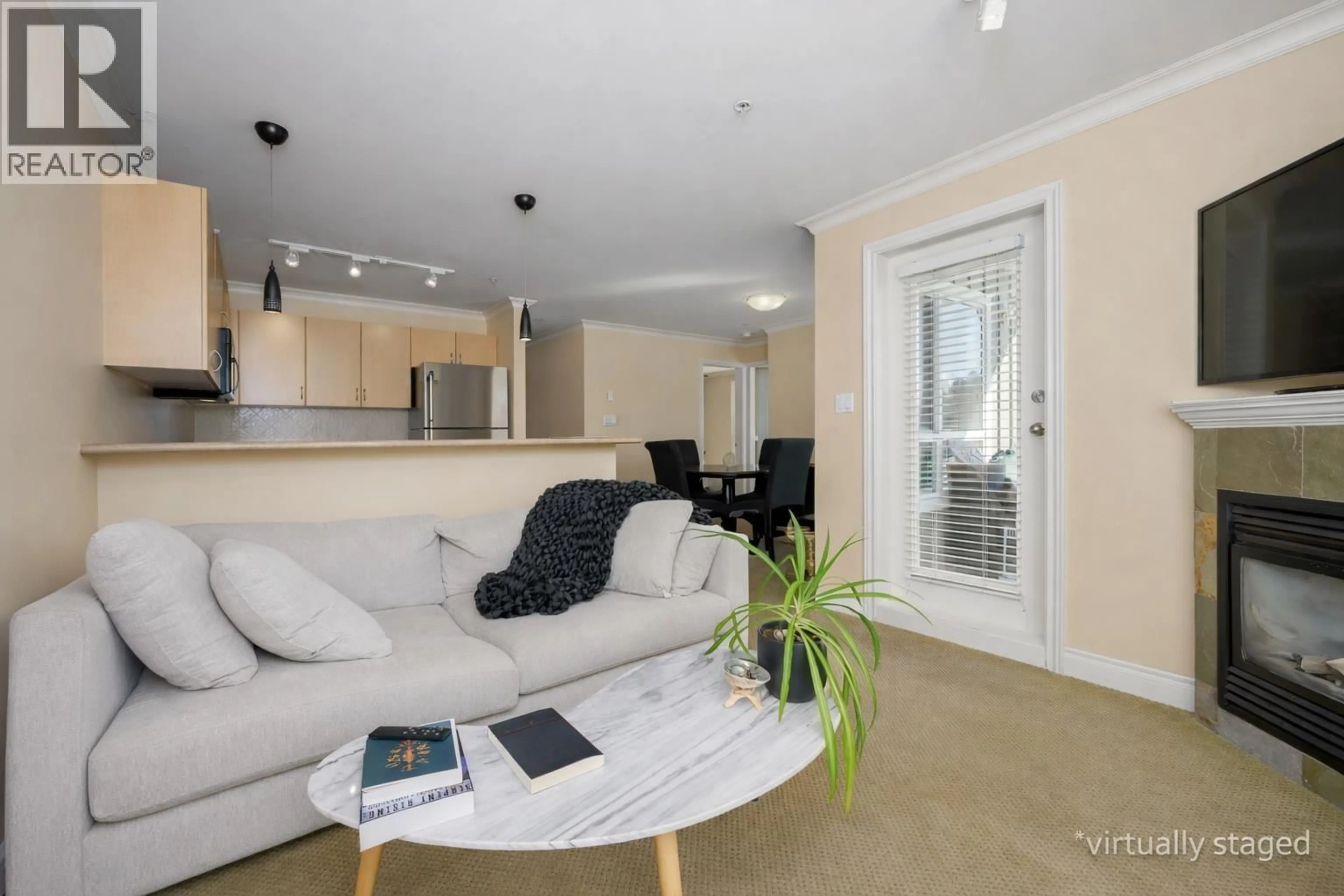 Living room with furniture, unknown for 201 - 128 21ST STREET, North Vancouver British Columbia V7M1Y9