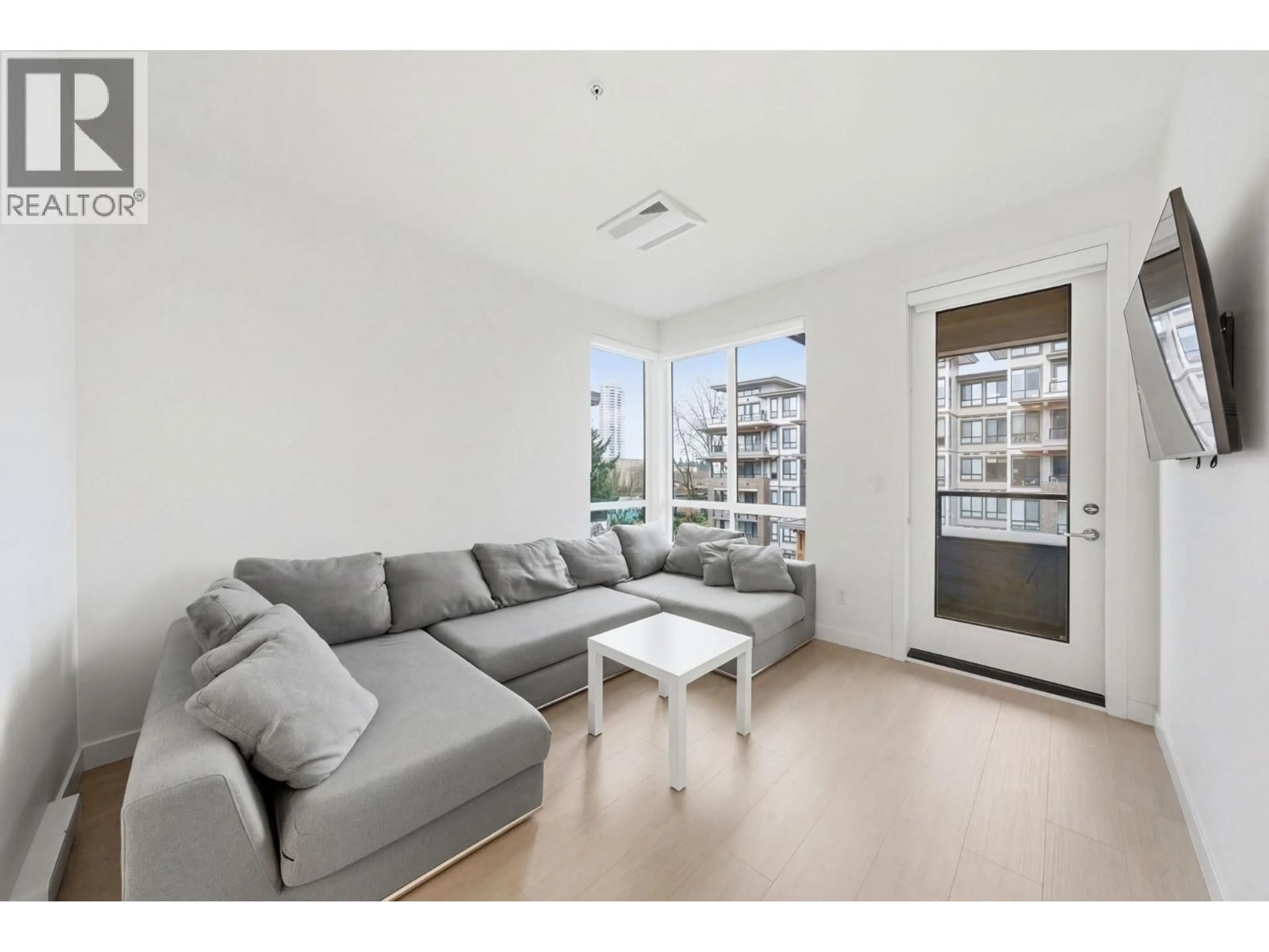 Living room with furniture, unknown for 418 - 7588 16TH STREET, Burnaby British Columbia V3N0H8