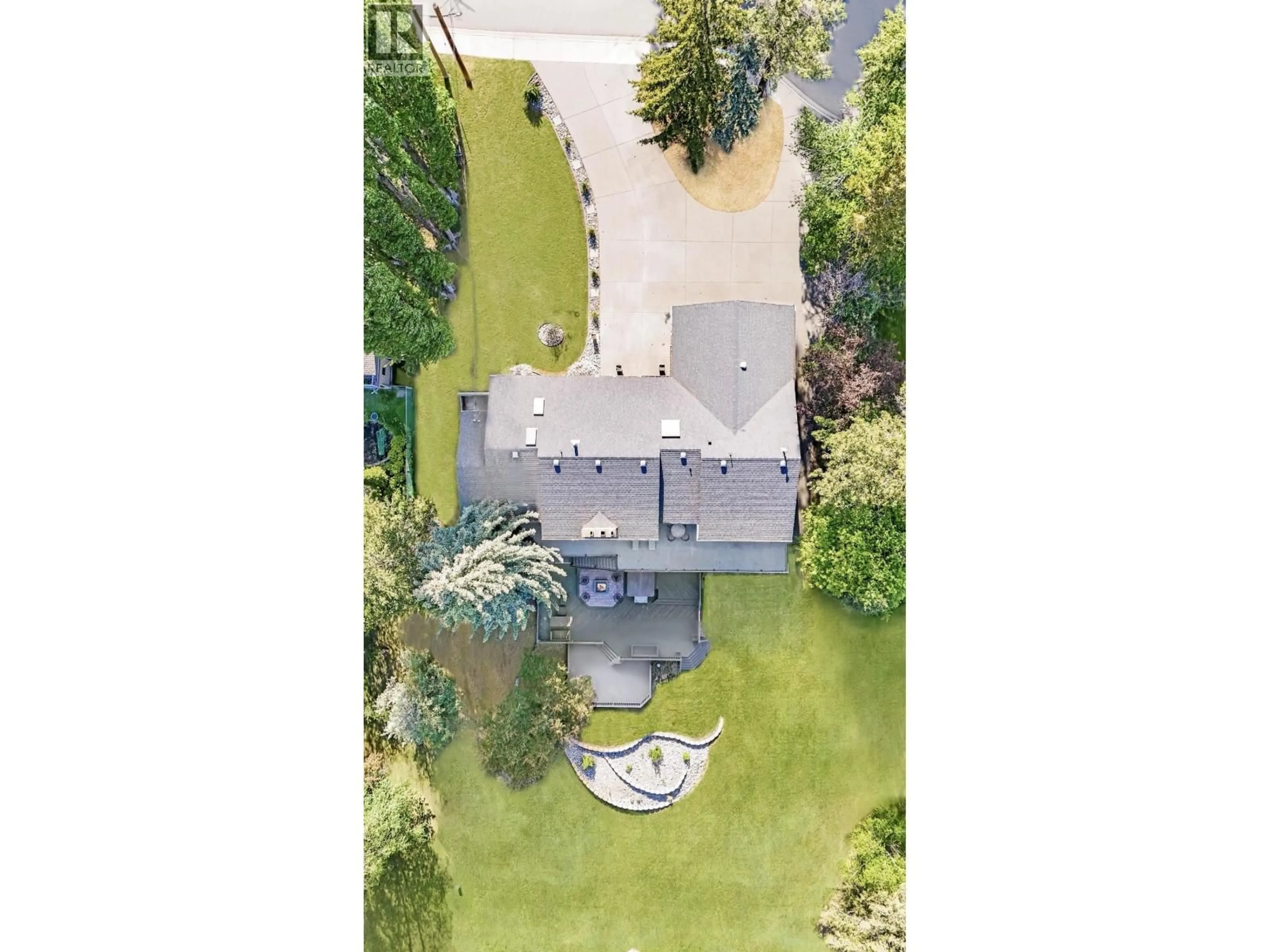 A pic from outside/outdoor area/front of a property/back of a property/a pic from drone, street for 154 COUNTRY CLUB BOULEVARD, Williams Lake British Columbia V2G3T2