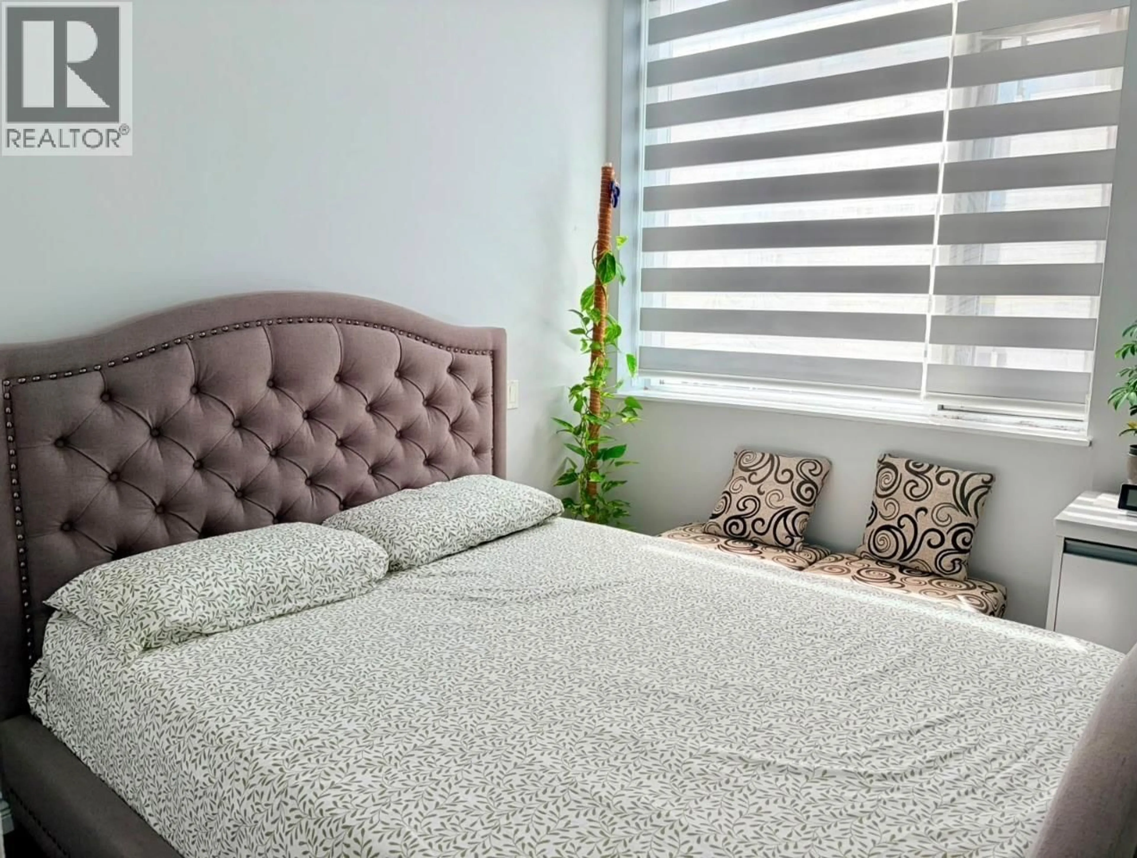 Bedroom with bed, unknown for 203 - 6460 MAIN STREET, Vancouver British Columbia V5W2V4